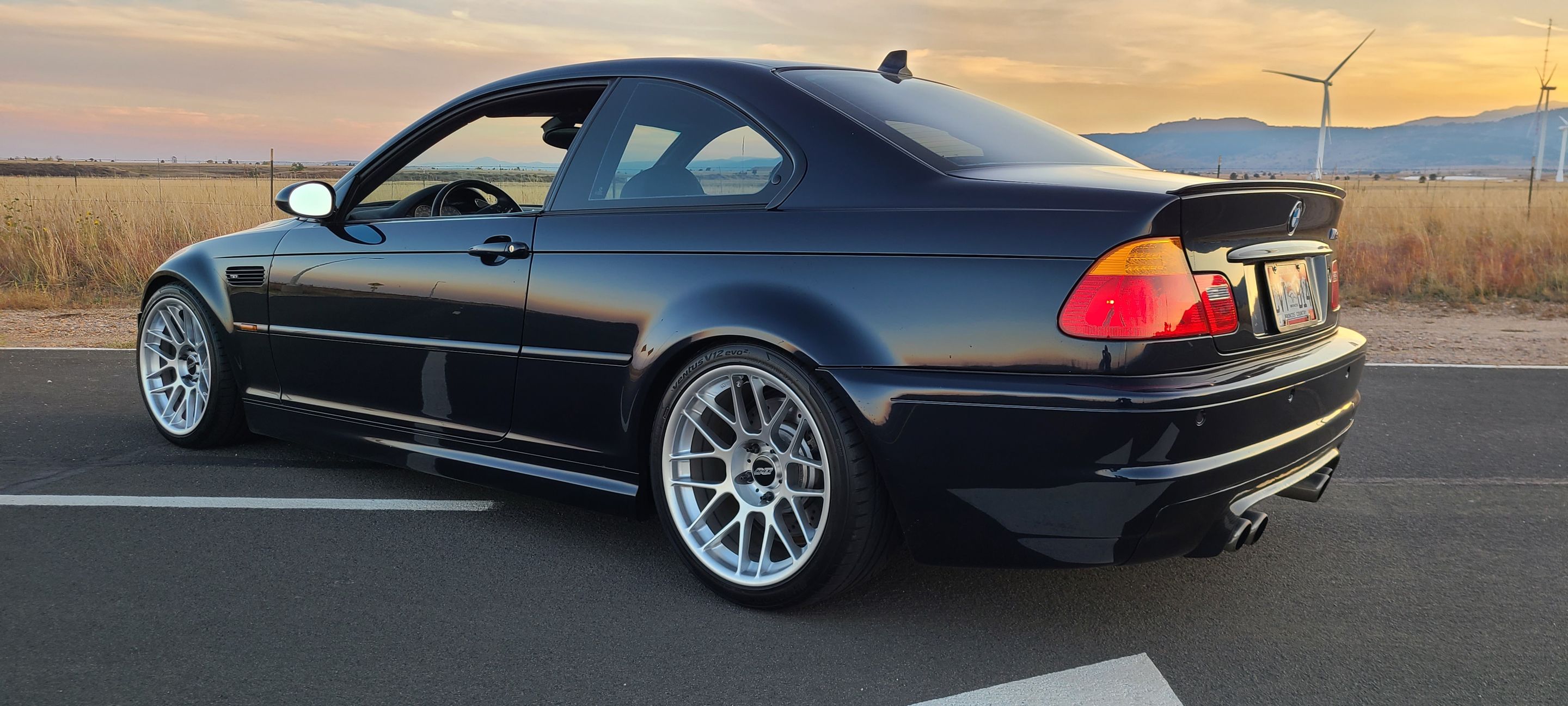 Black BMW E46 M3 with 18" ARC-8 Apex wheels in Hyper Silver