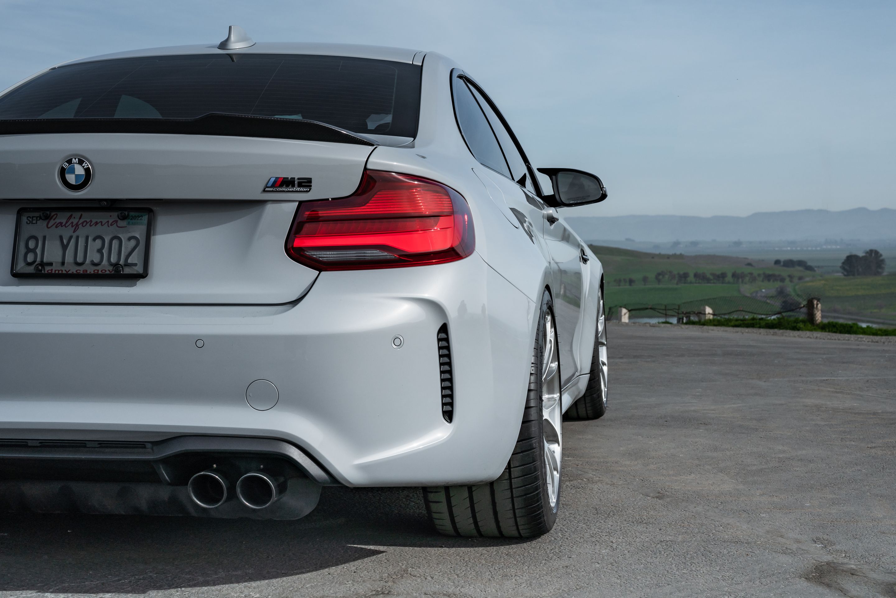 Silver BMW F87 M2 with 19" EC-7RS Apex wheels in Brushed Clear