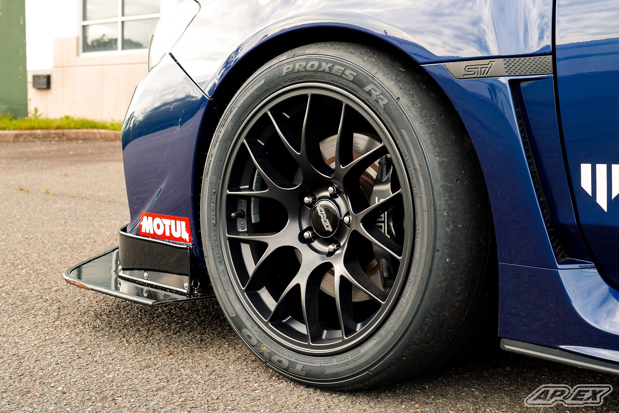 Blue Subaru VA WRX STI with 18" EC-7 Apex wheels in Satin Black