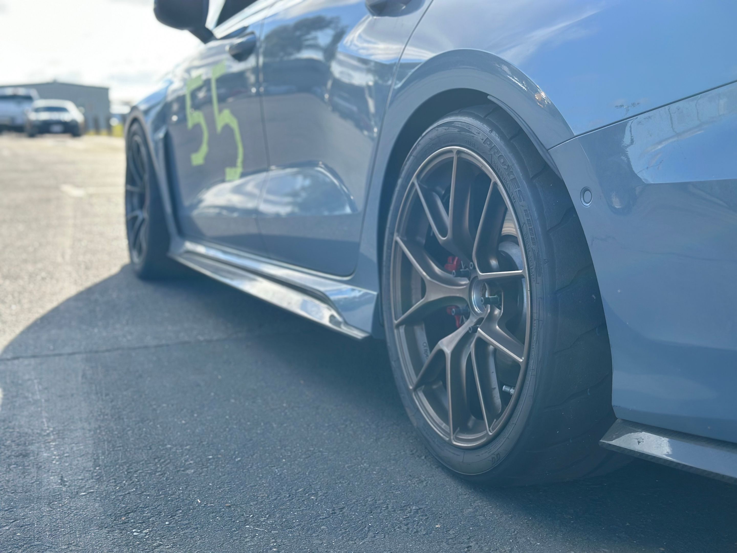 Blue Audi 8Y RS 3 with 18" VS-5RS Apex wheels in Anthracite