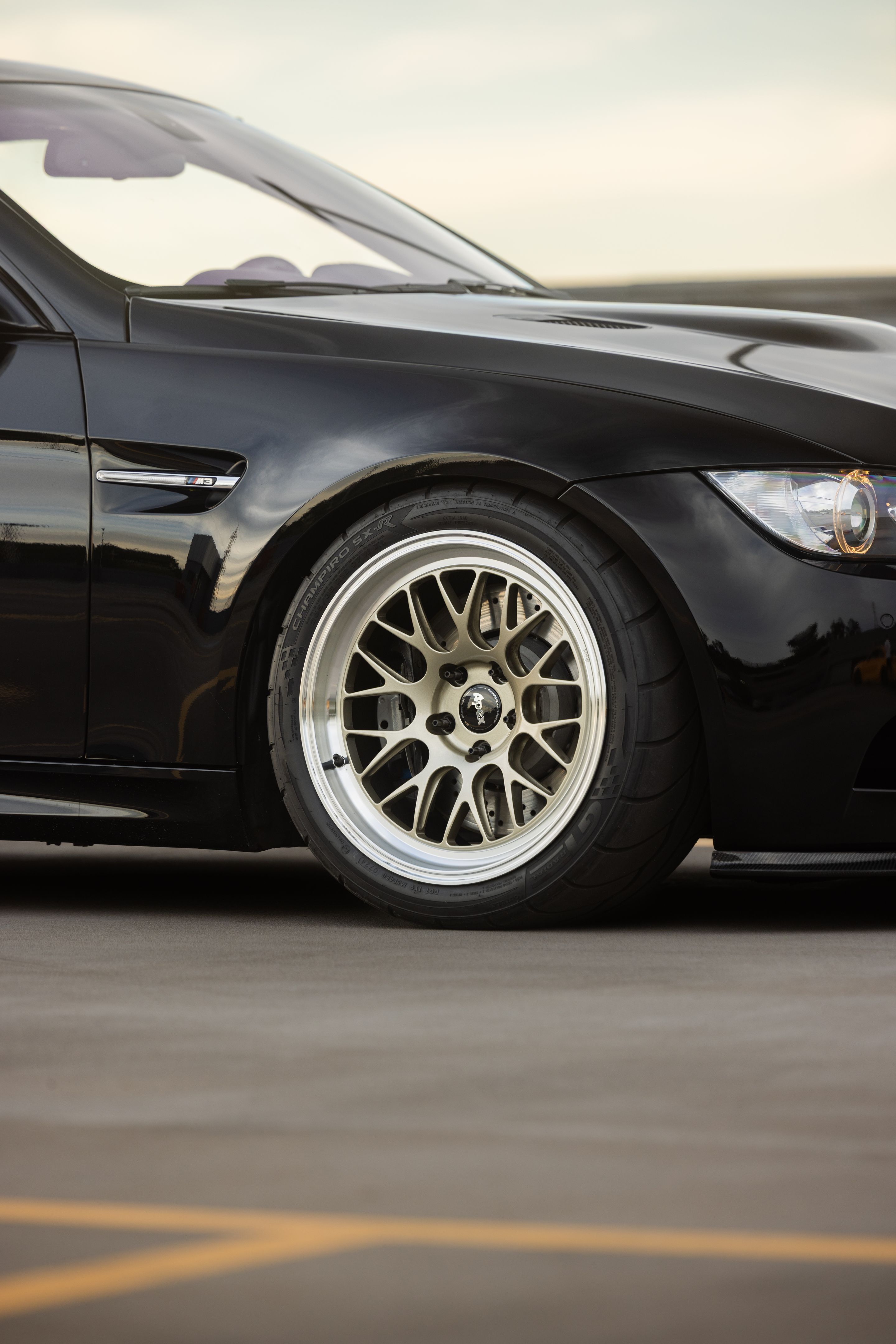 Black BMW E92 Coupe M3 with 18" ML-10RT Apex wheels in Machined Lip Gloss Motorsport Gold