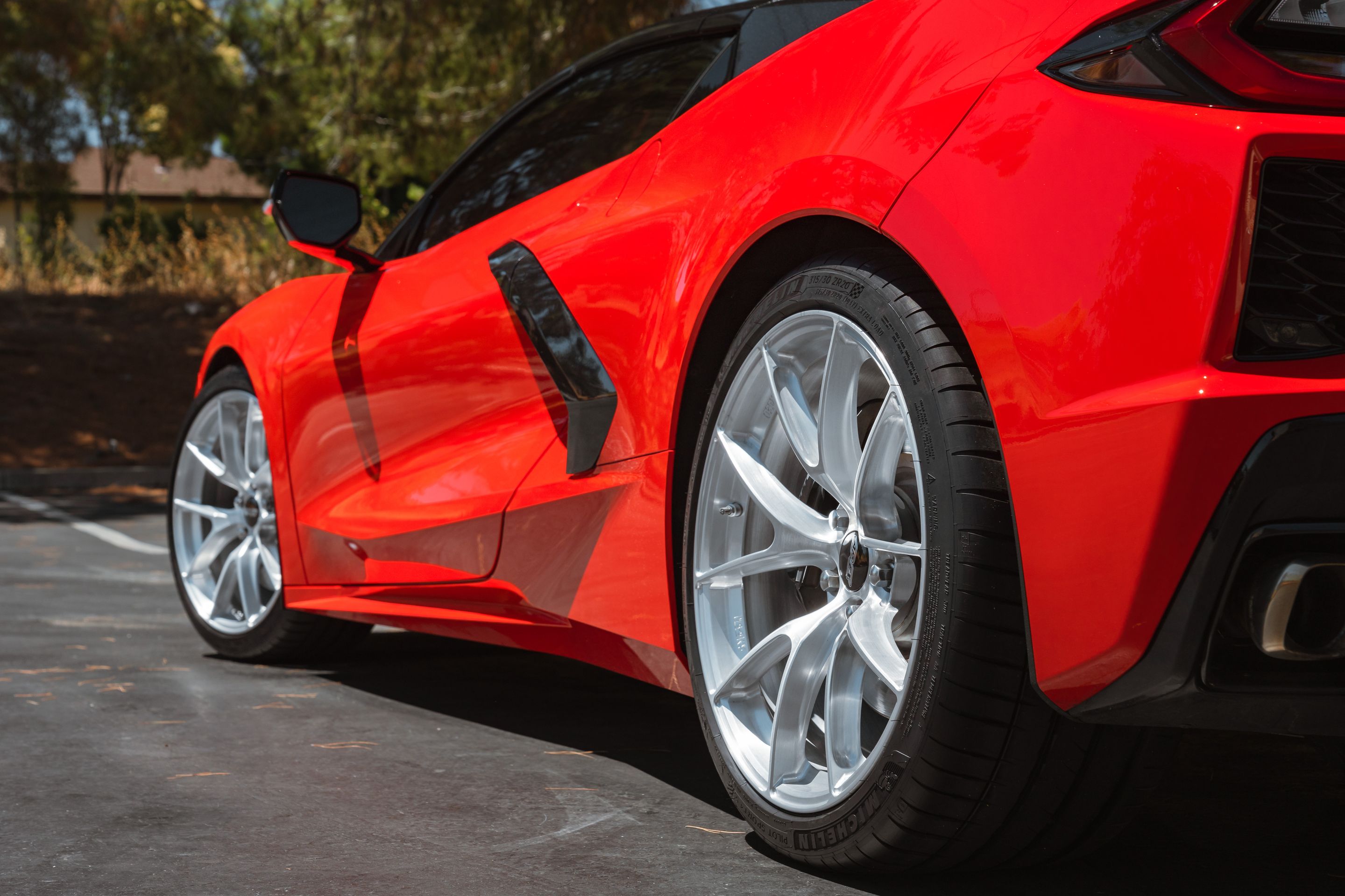 Red Chevrolet C8 Corvette Stingray/Z51 with 19"/20" VS-5RS Apex wheels in Brushed Clear
