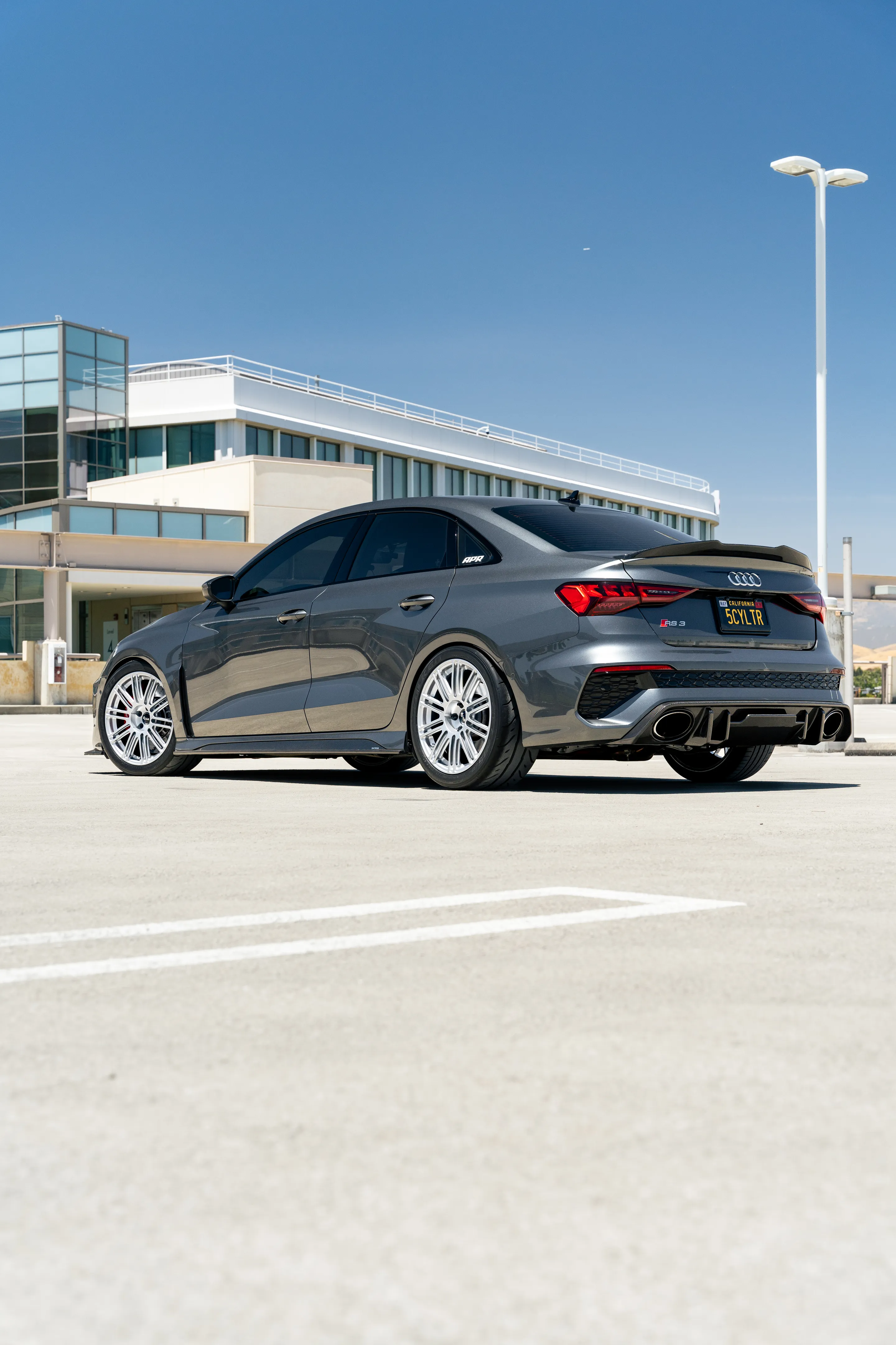 Grey Audi 8Y RS 3 with 18" TC-10RT Apex wheels in Race Silver