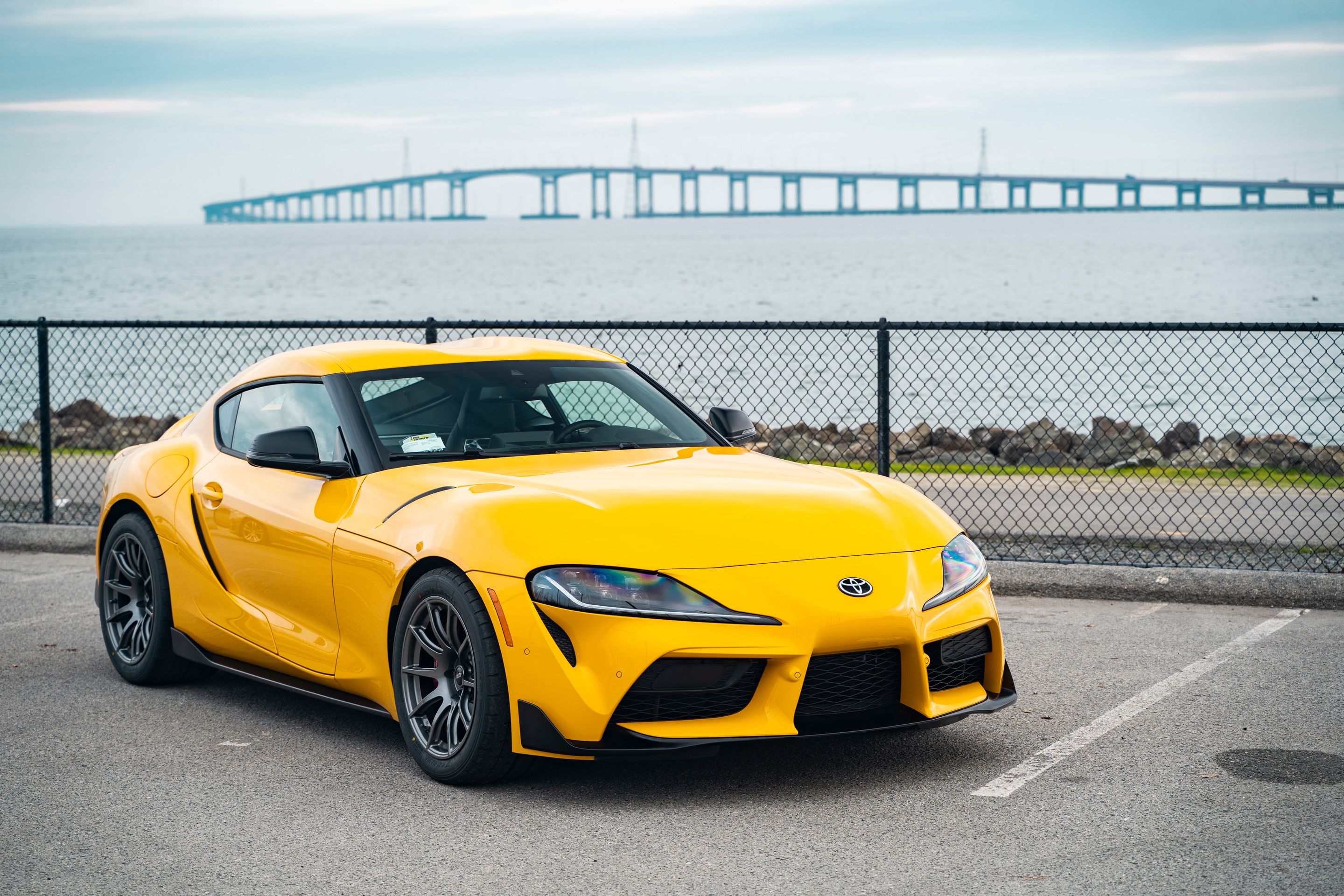 Yellow Toyota GR Supra with 18" SM-10 Apex wheels in Anthracite
