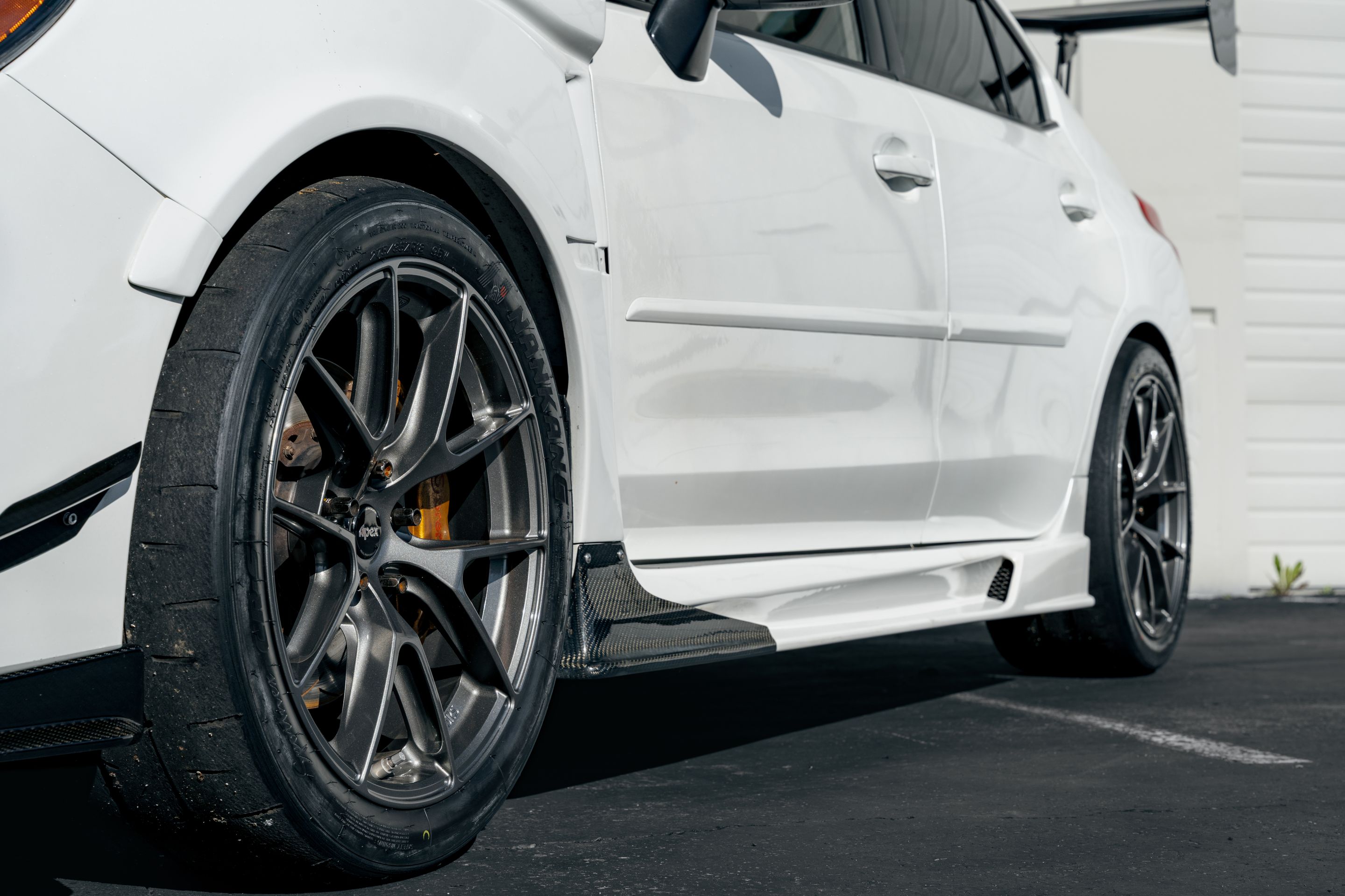 White Subaru VA WRX STI with 18" VS-5RS Apex wheels in Anthracite