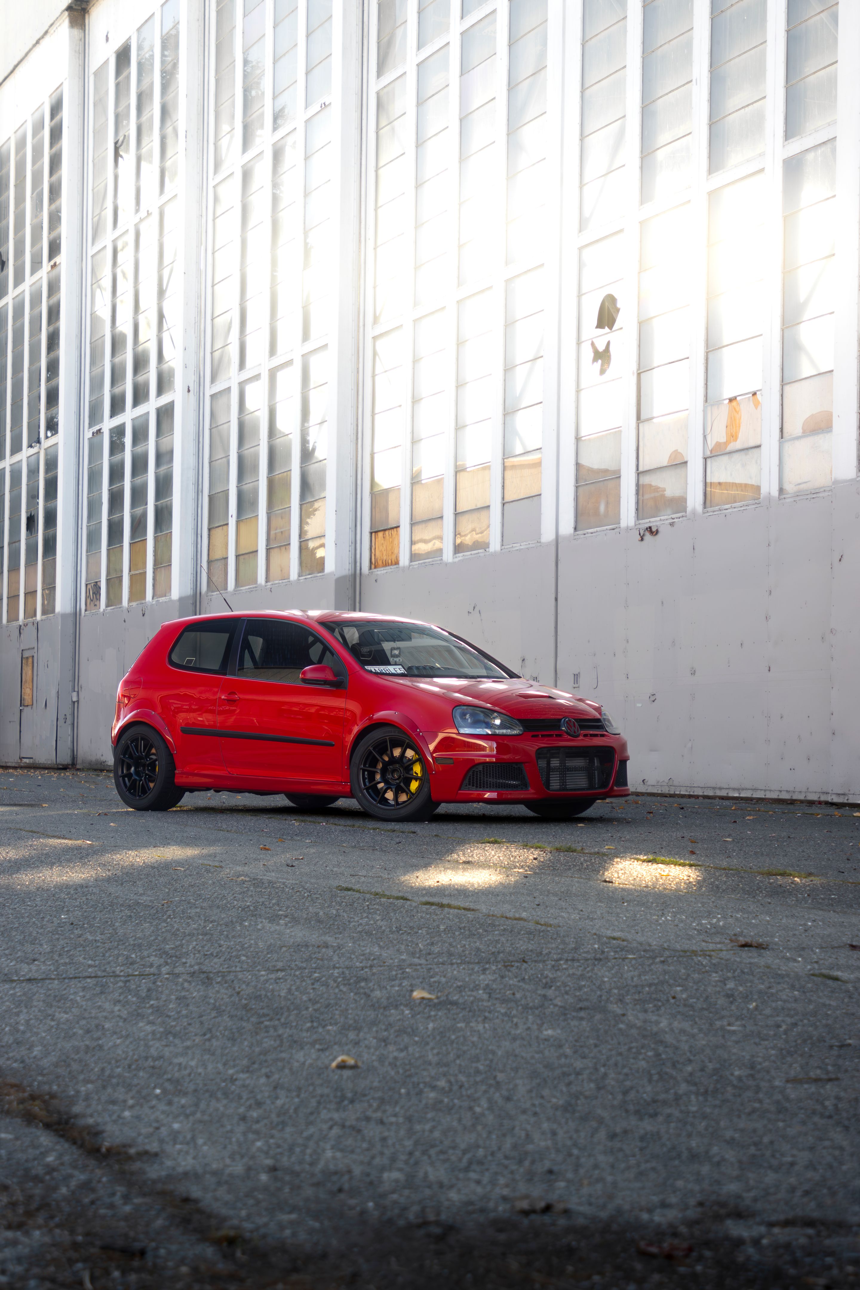 Red VW MK5 Golf with 17" SM-10 Apex wheels in Satin Black