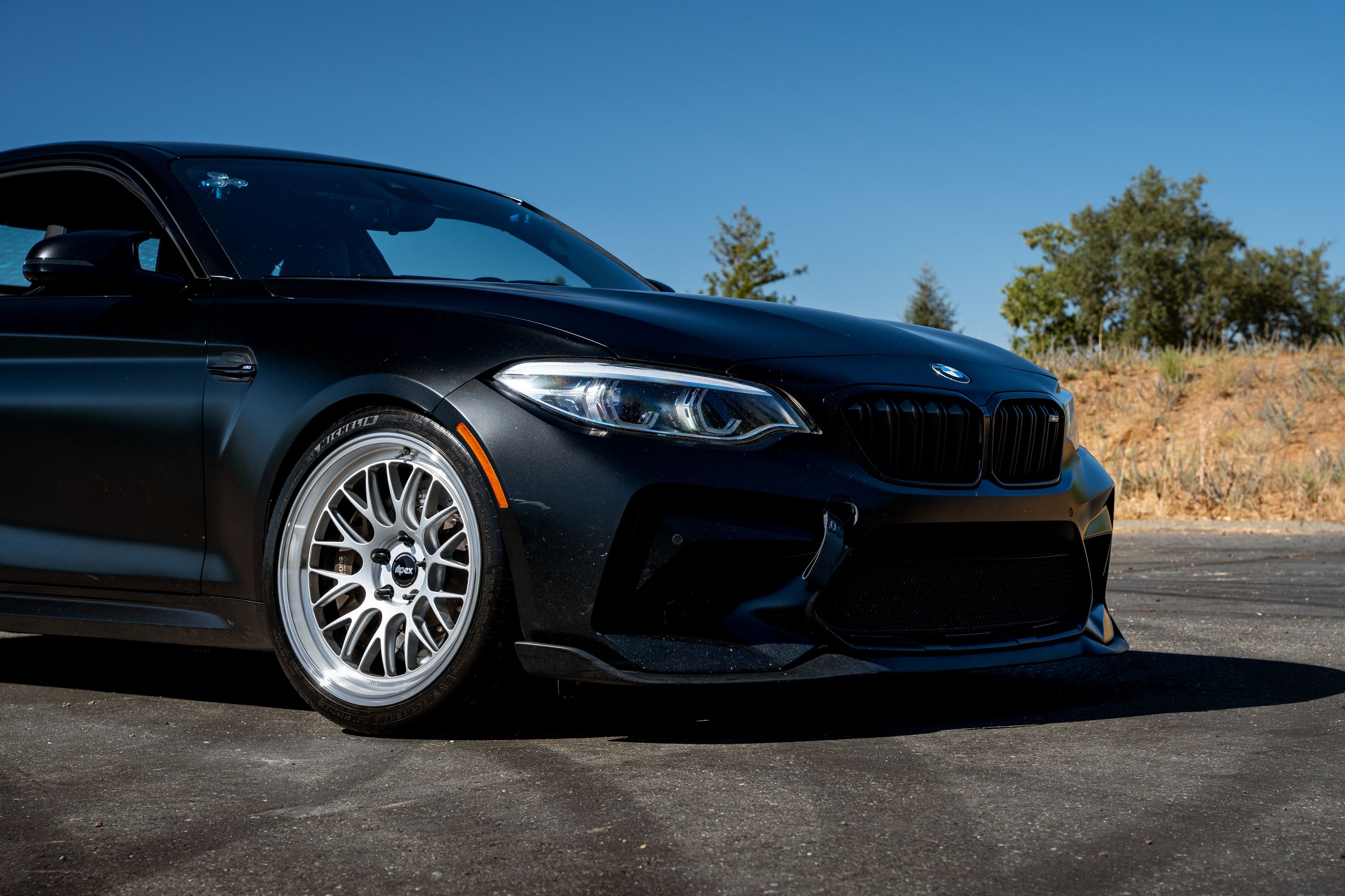 Black BMW F87 M2 with 19" ML-10RT Apex wheels in Machined Lip Race Silver