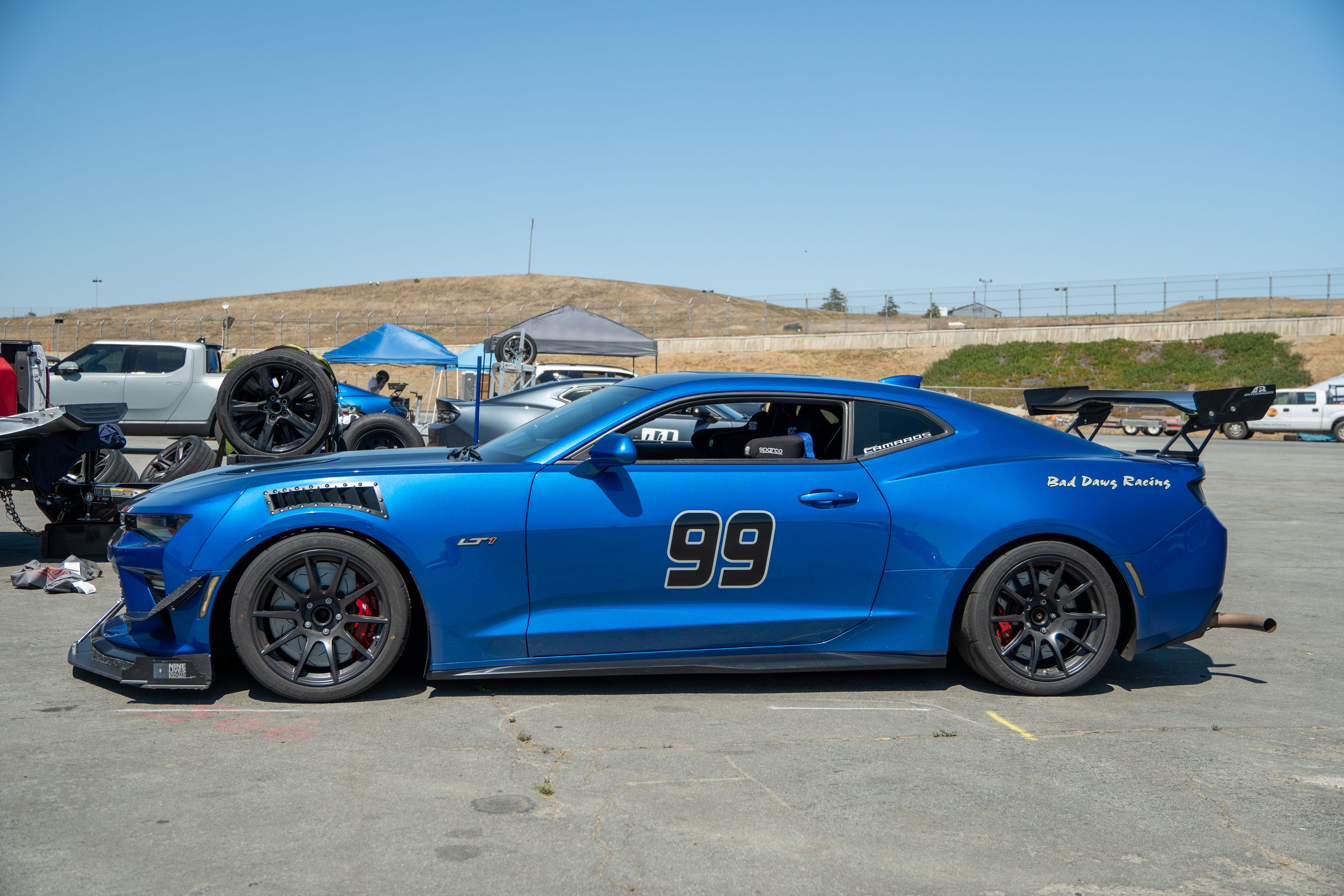 Blue Chevrolet 6th Gen Camaro SS with 18" SM-10 Apex wheels in Satin Black