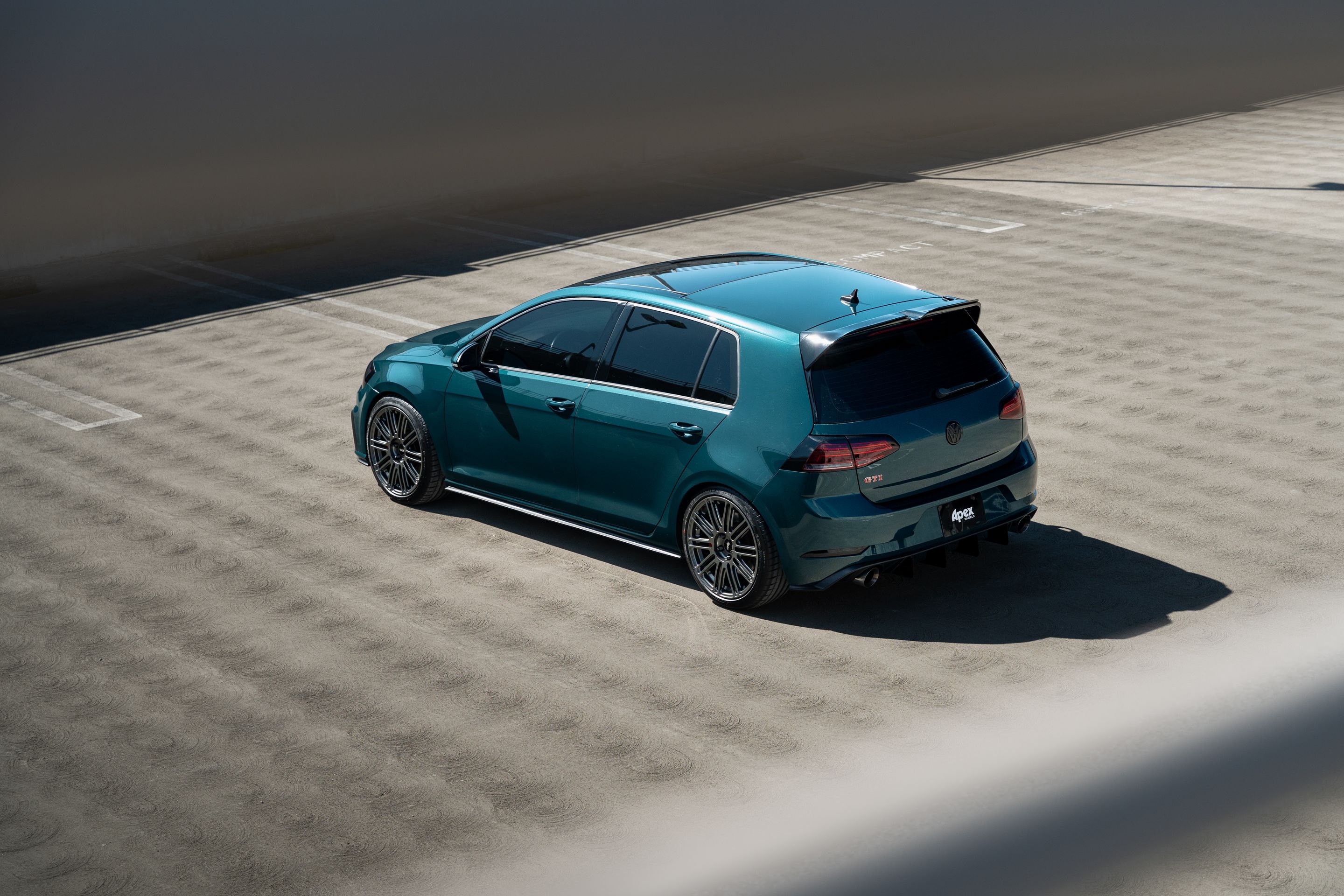 Green VW MK7 GTI with 18" TC-10RT Apex wheels in Anthracite