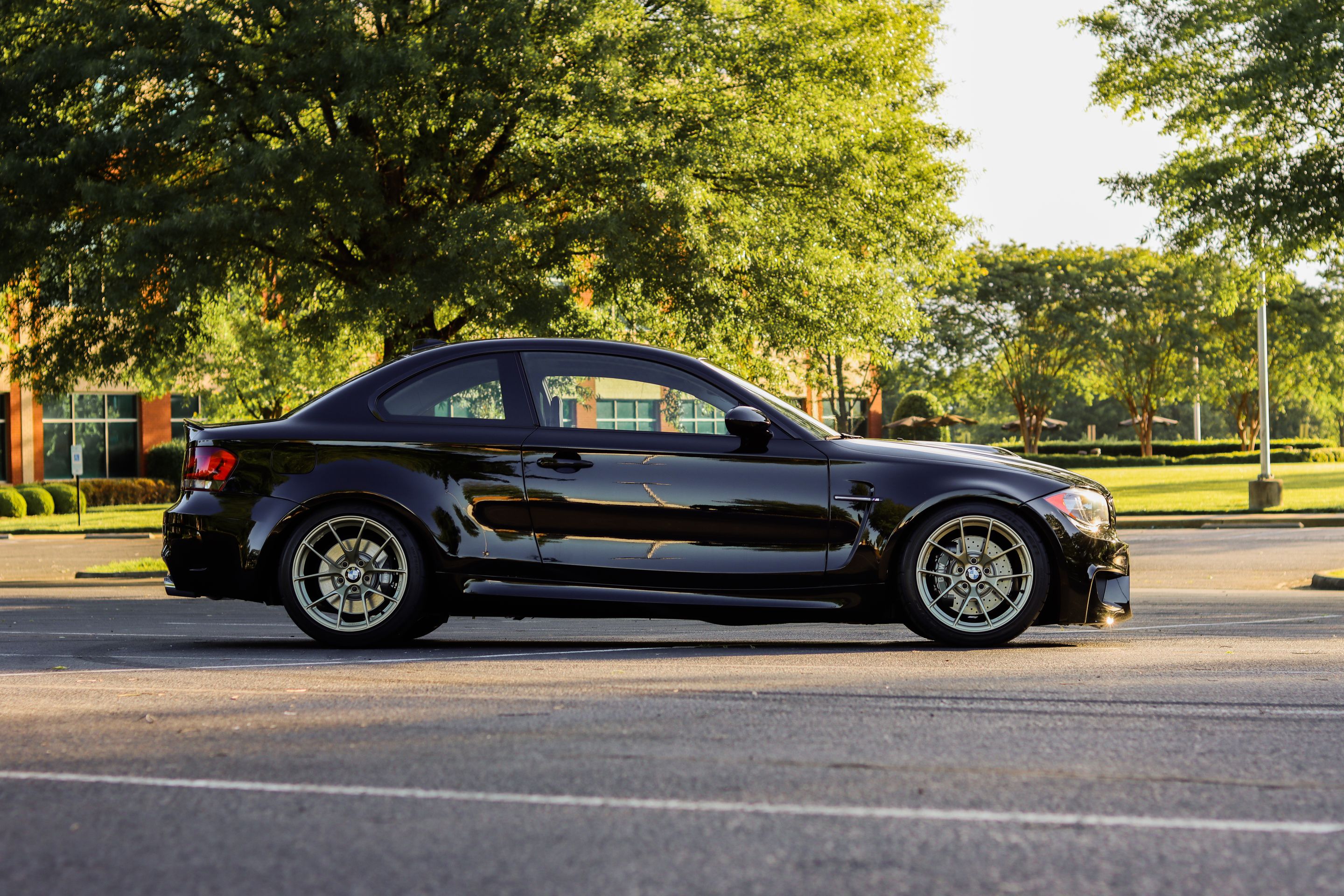 Black BMW E82 Coupe 1 Series with 18" VS-5RS Apex wheels in Motorsport Gold
