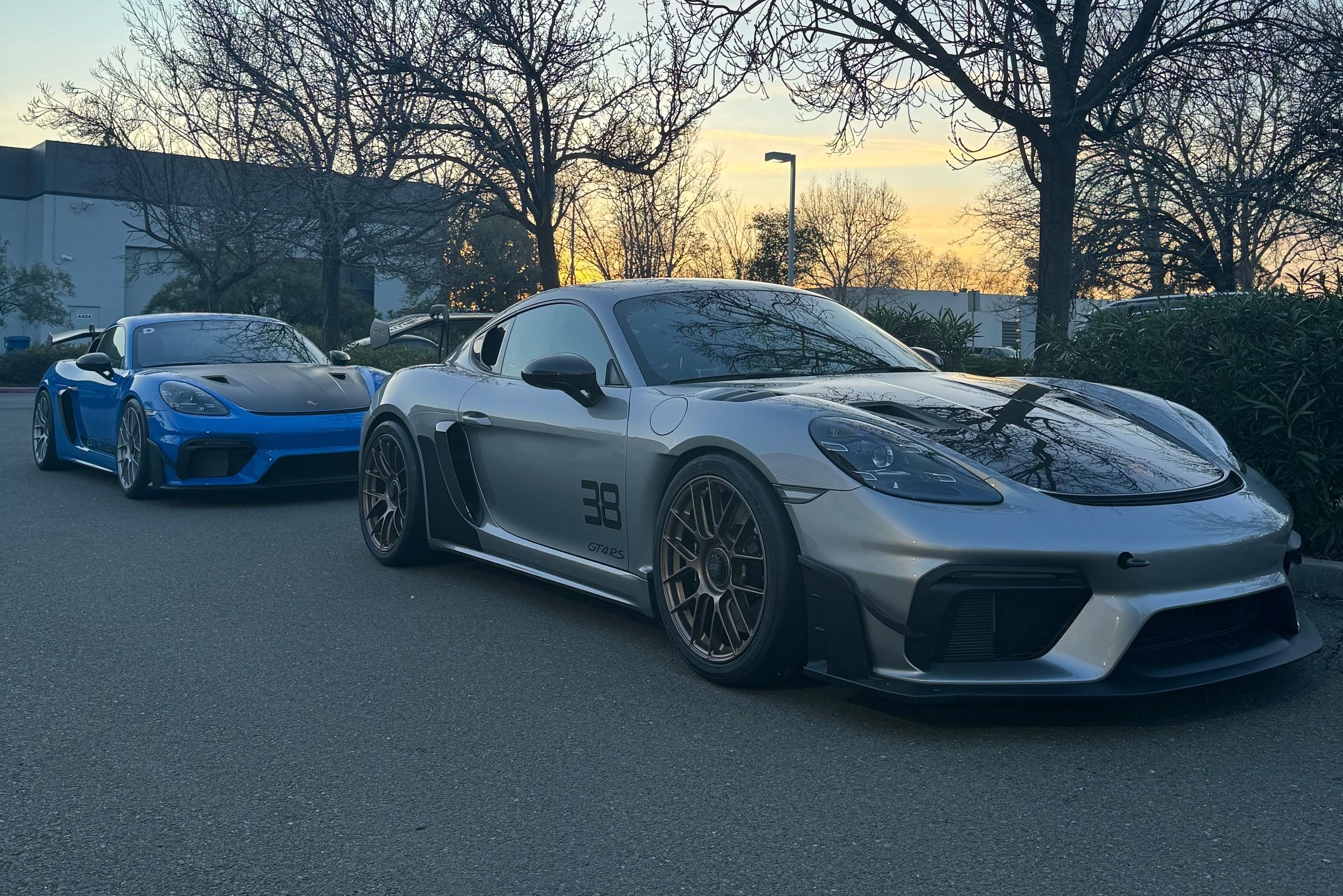 Silver Porsche 718 Cayman GT4 RS with 19" EC-7RS Apex wheels in Custom Finish