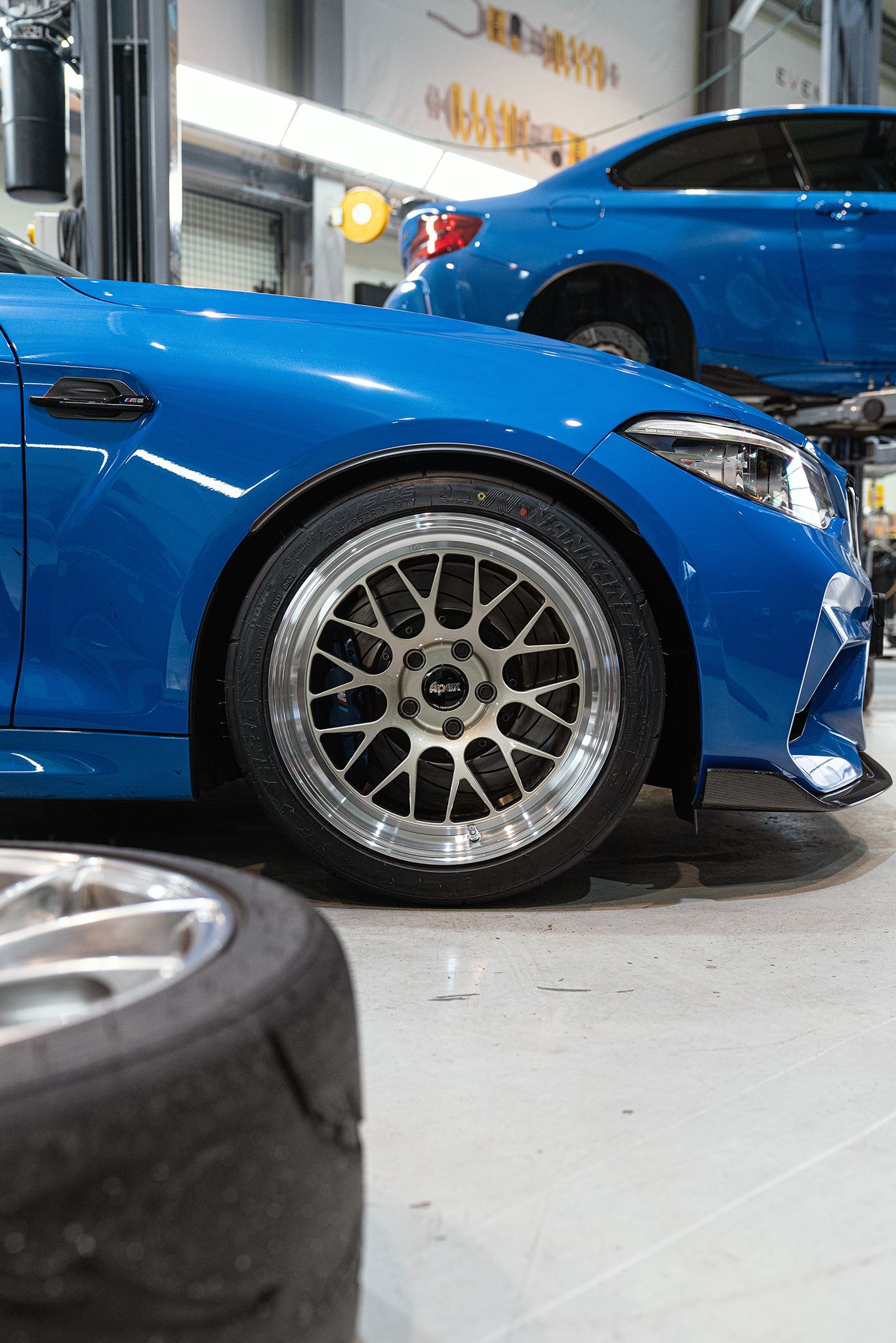 Blue BMW F87 M2 with 18" ML-10RT Apex wheels in Machined Lip Gloss Motorsport Gold