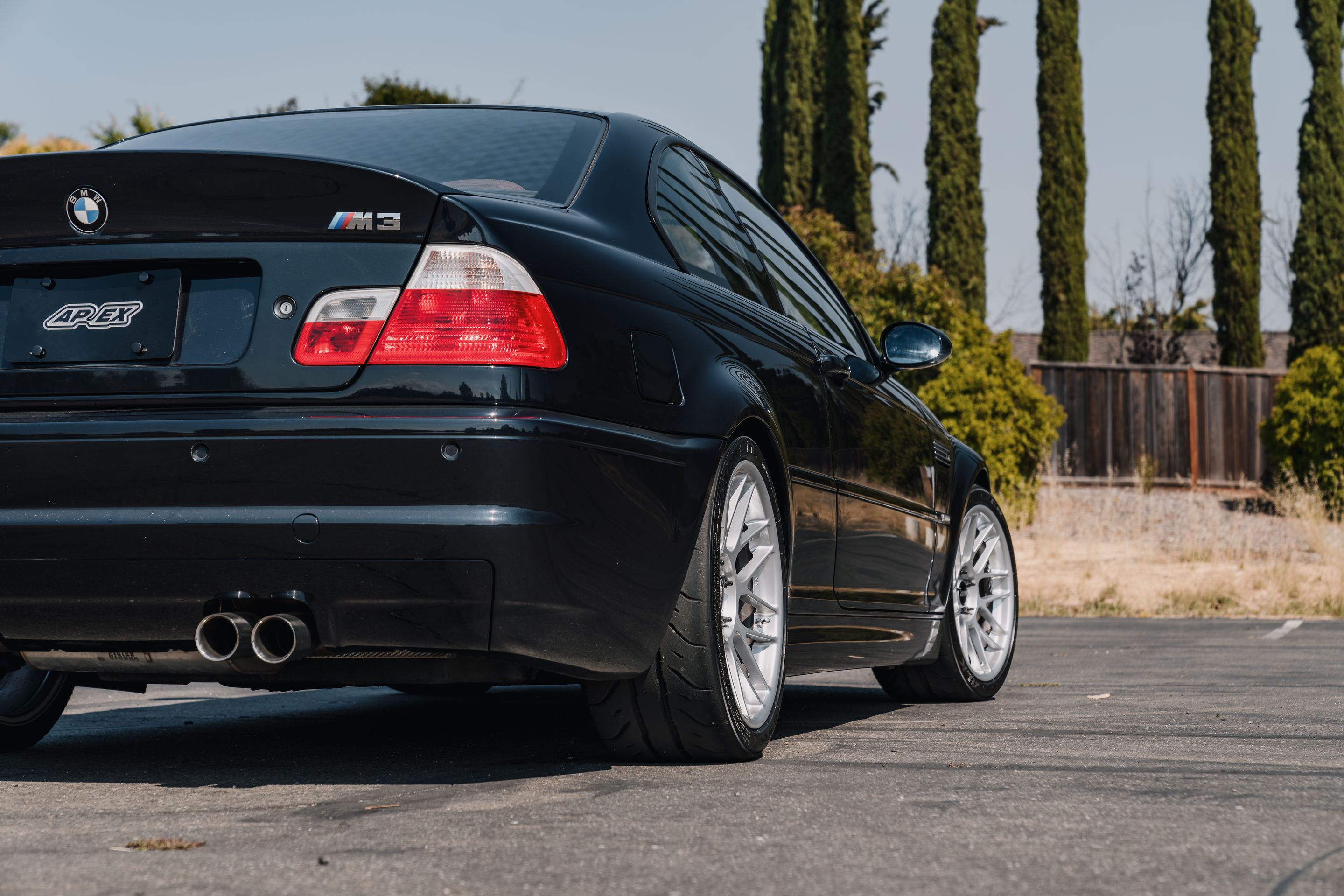 Black BMW E46 M3 with 18" ARC-8 Apex wheels in Hyper Silver