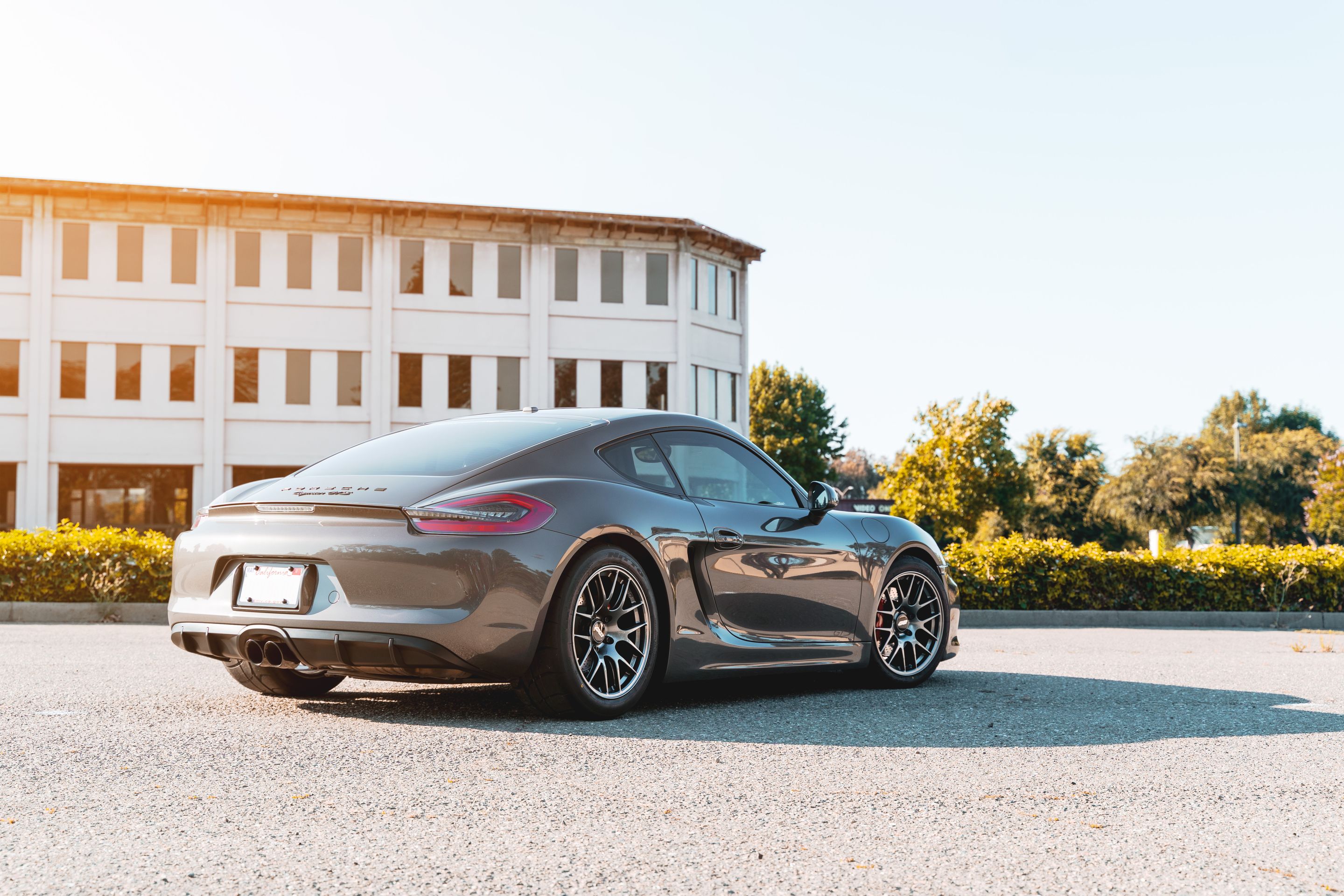 Grey Porsche 981 Cayman GTS with 18" EC-7R Apex wheels in Anthracite