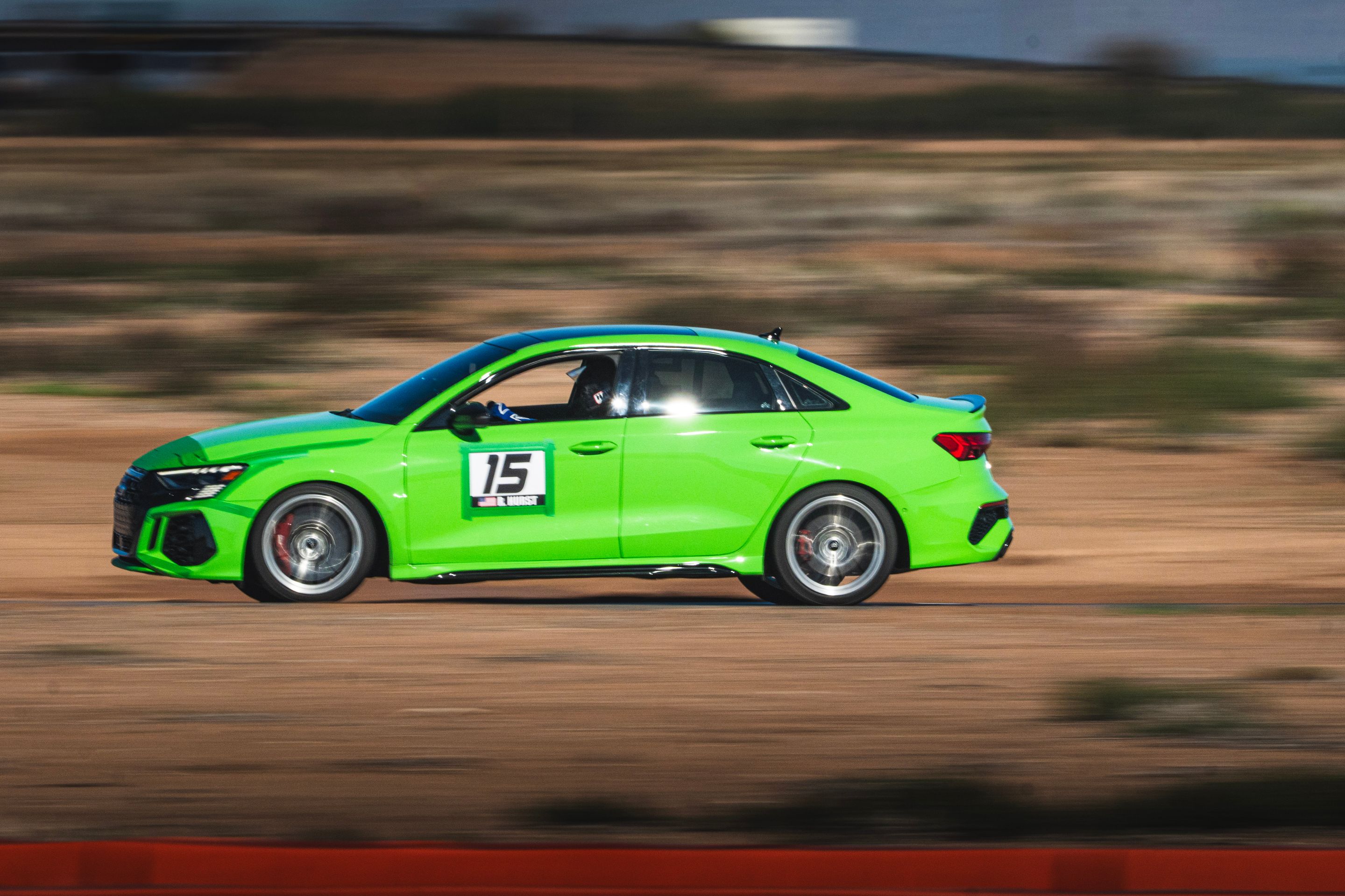 Green Audi 8Y RS 3 with 18" VS-5RS Apex wheels in Brushed Clear