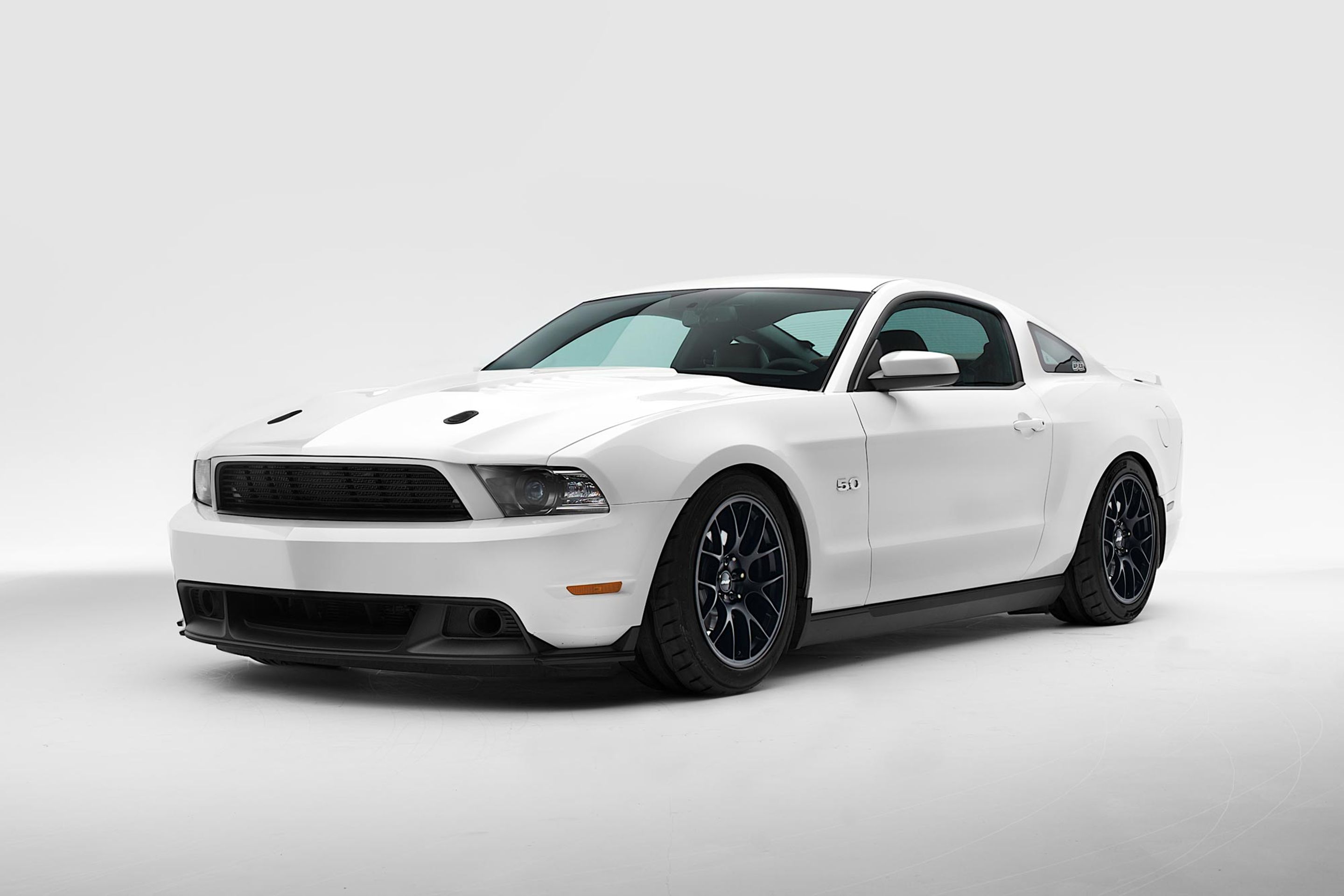 White Ford S197 Mustang GT with 18" EC-7 Apex wheels in Satin Black