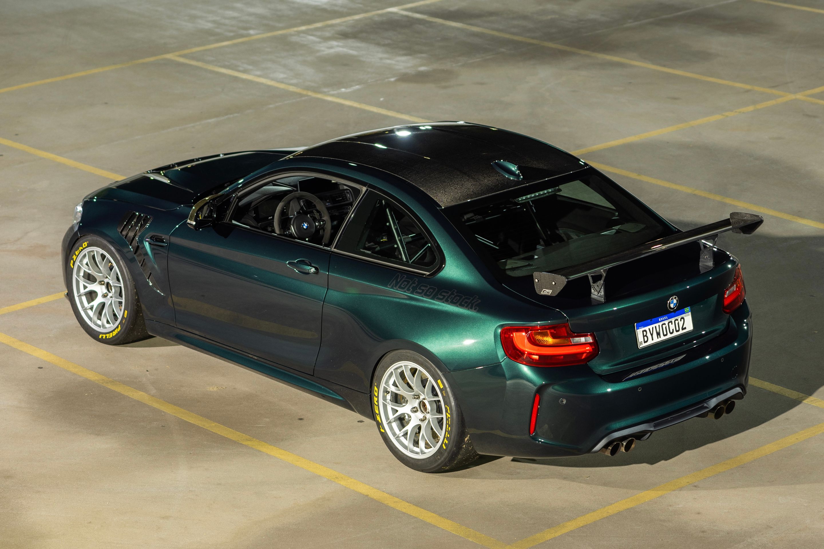 Green BMW F87 M2 with 18" EC-7 Apex wheels in Race Silver