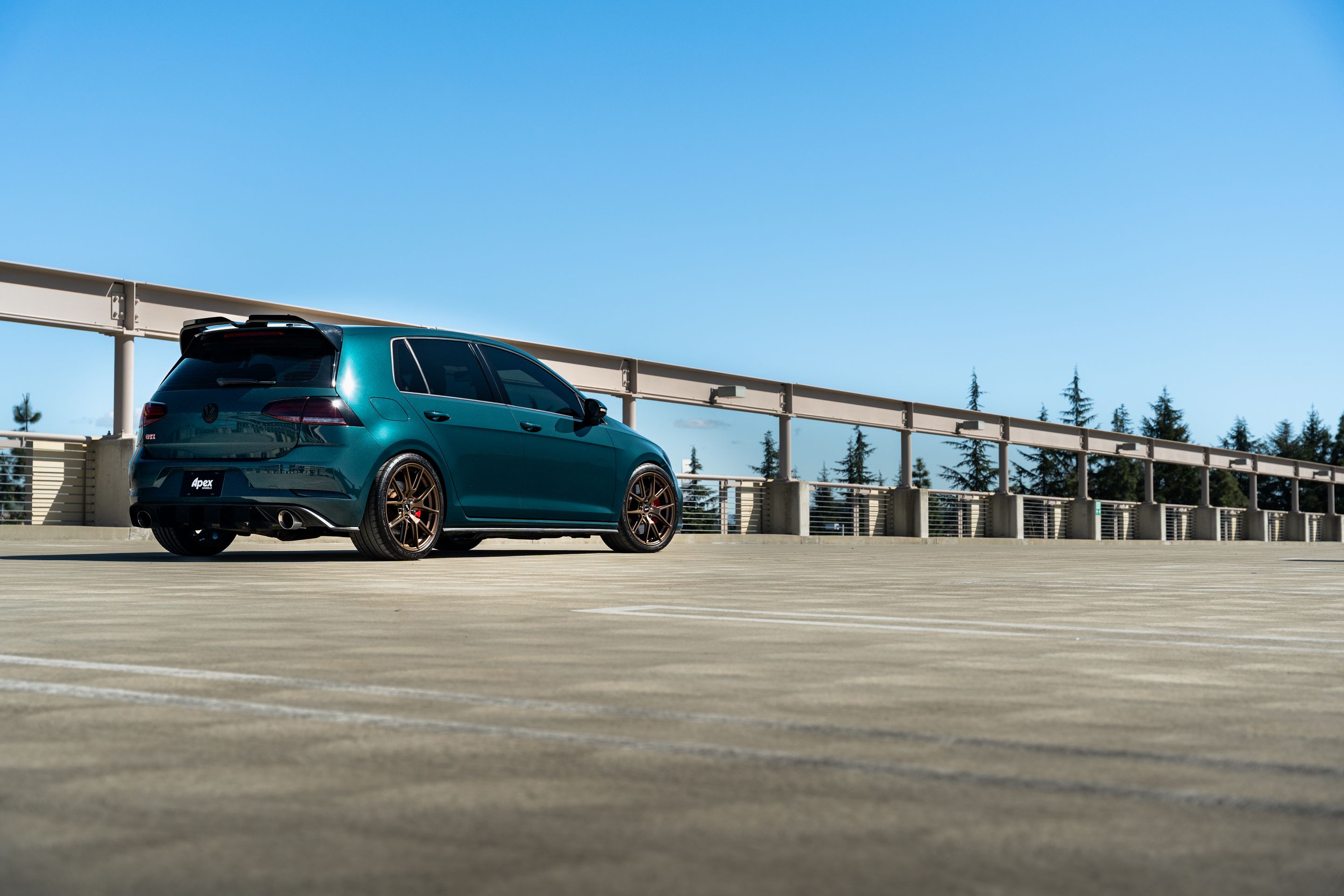 Green VW MK7 GTI with 18" VS-5 Apex wheels in Satin Bronze