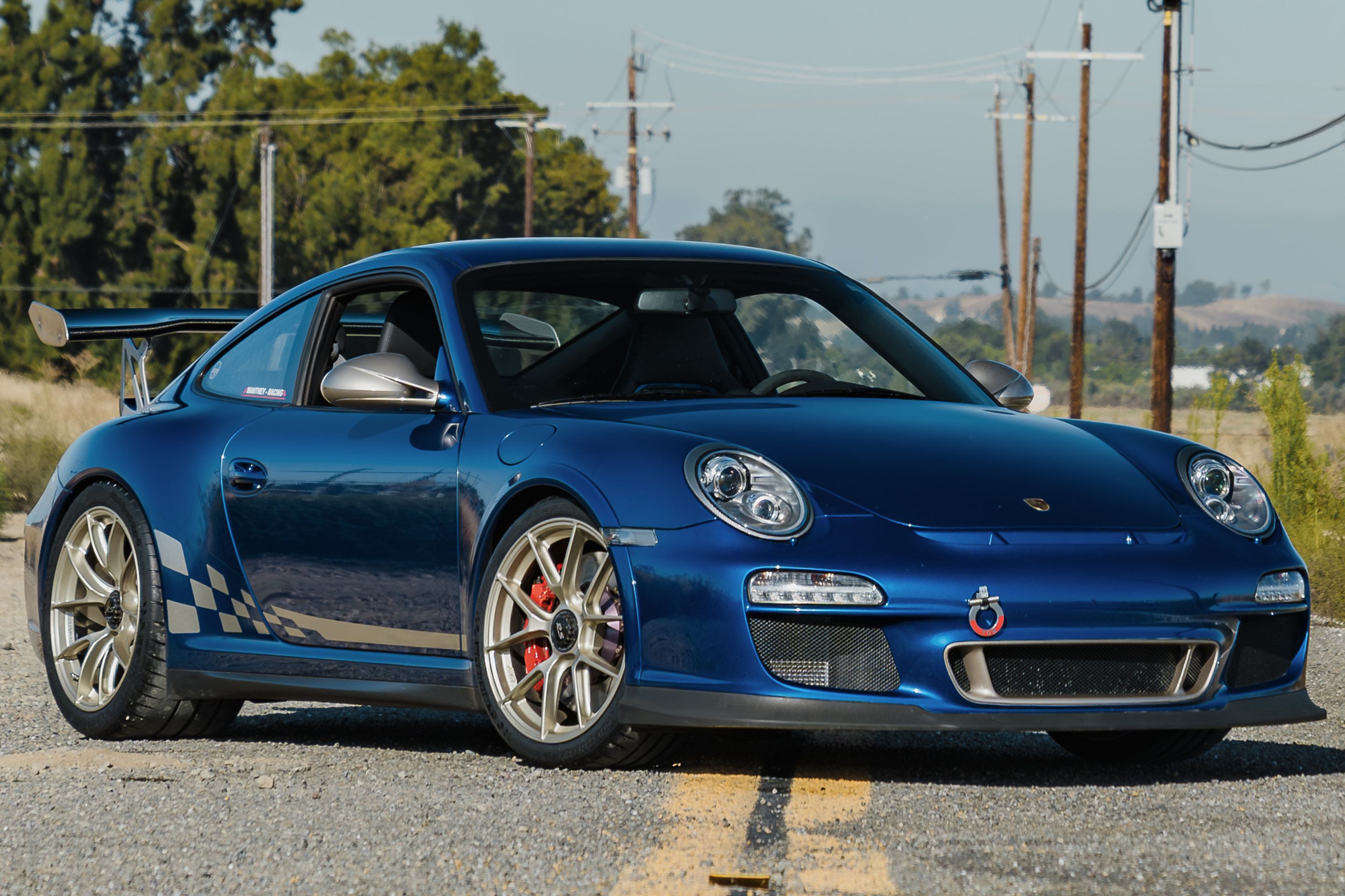 Blue Porsche 911 997 GT3 RS with 19" VS-5RS Apex wheels in Motorsport Gold