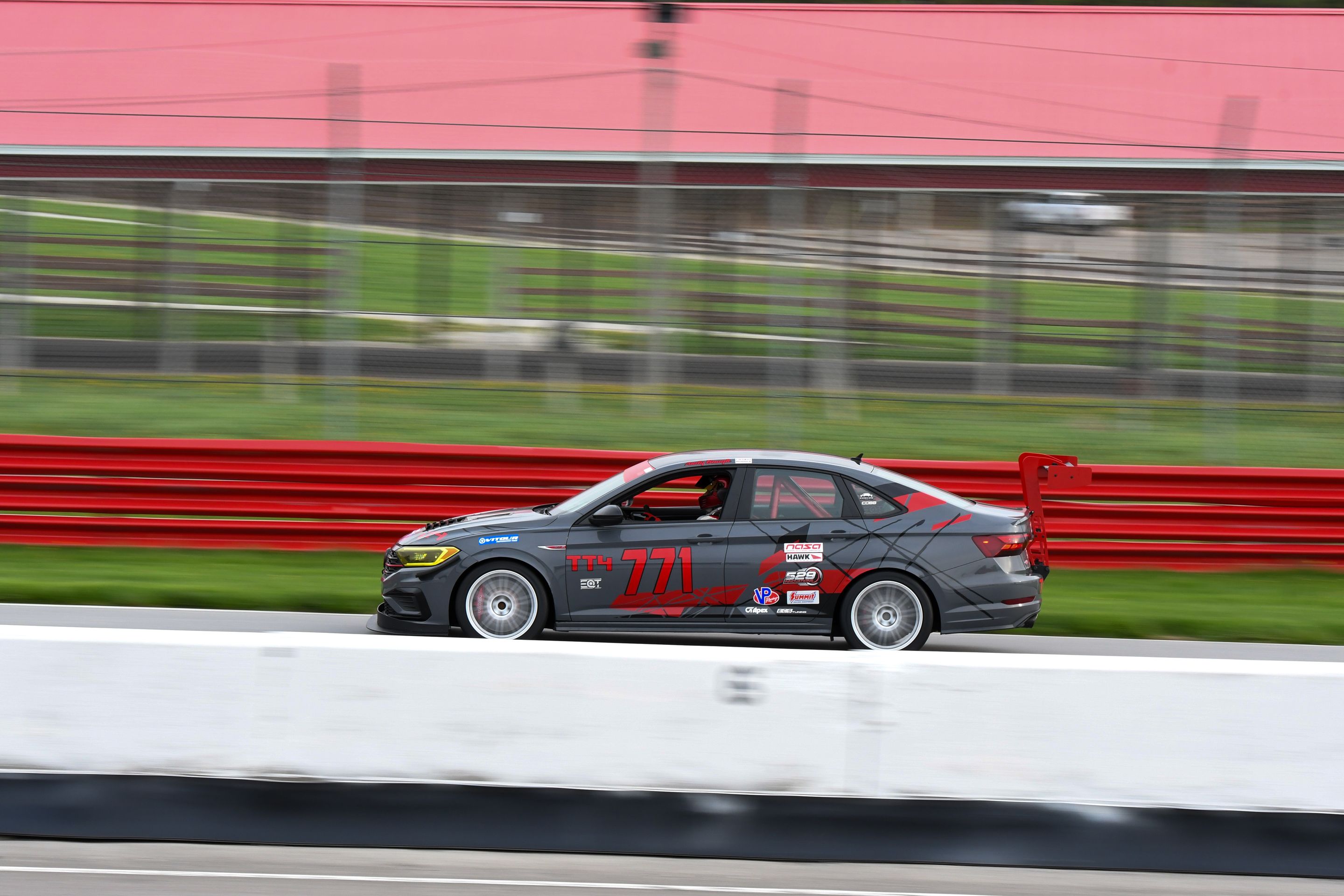 Race Livery VW MK7 GLI with 18" TC-10RT Apex wheels in Race Silver
