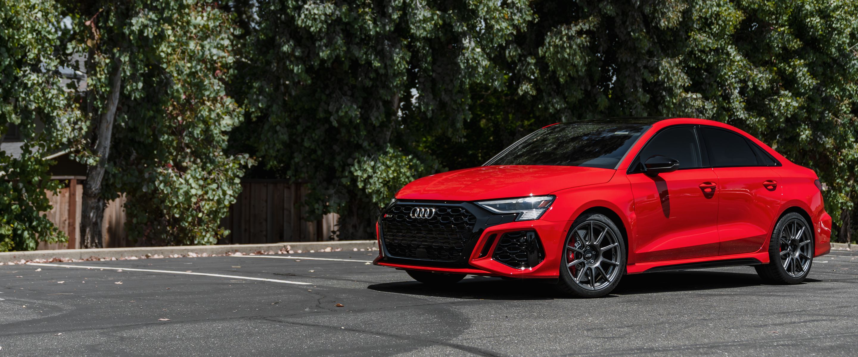 Red Audi 8Y RS 3 with 18" SM-10 Apex wheels in Anthracite