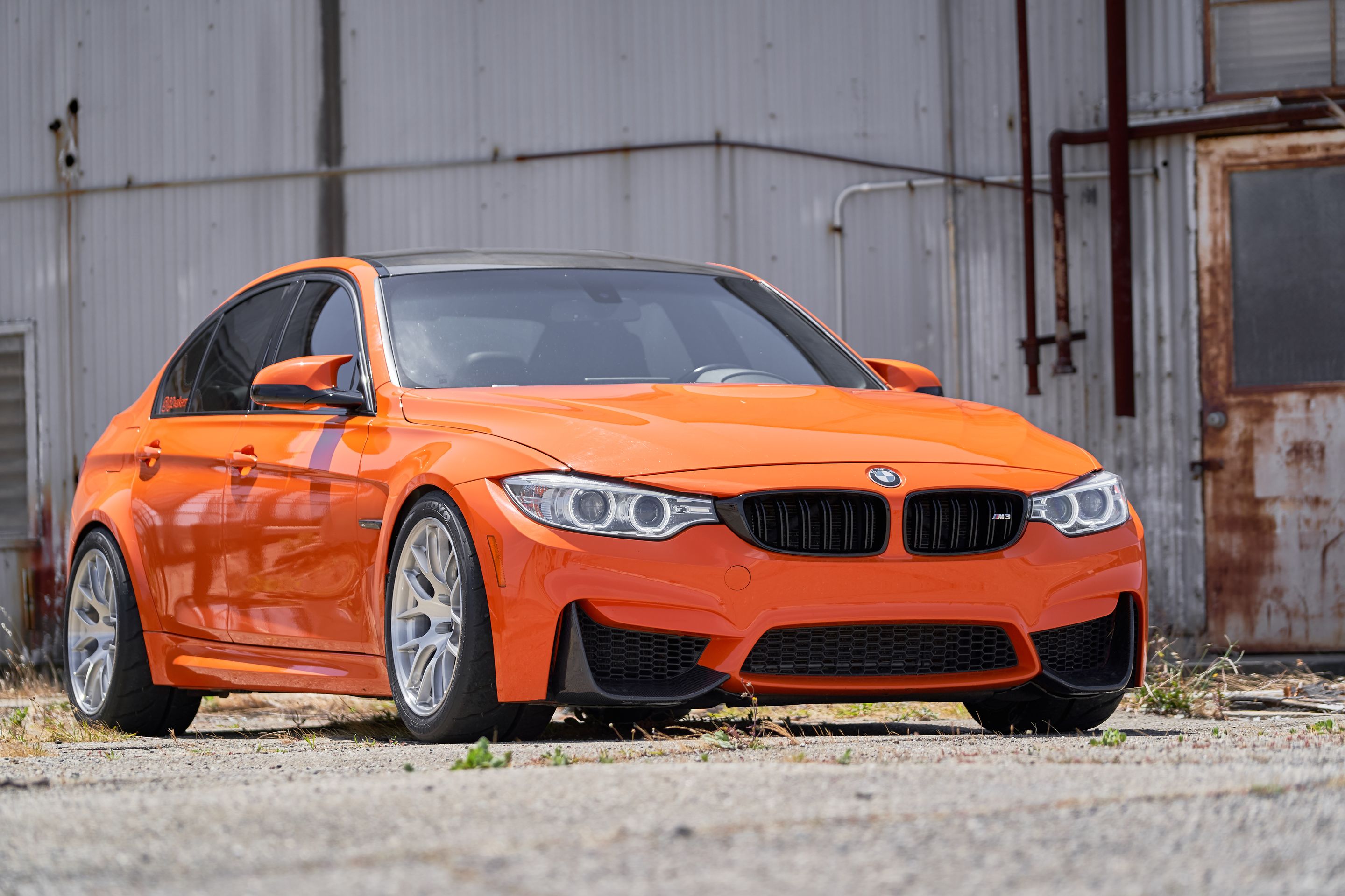 Orange BMW F80 M3 with 18" EC-7R Apex wheels in Brushed Clear