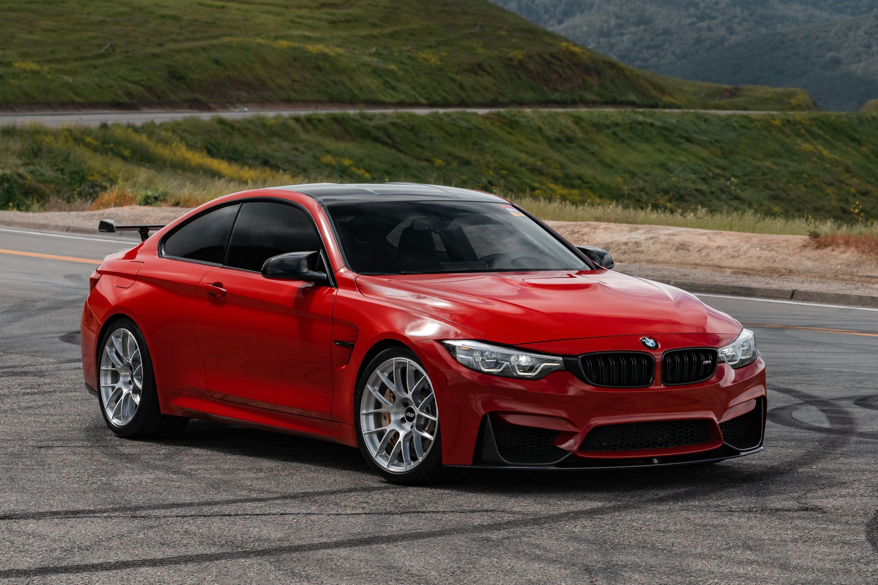Red BMW F82 Coupe M4 with 19" EC-7RS Apex wheels in Brushed Clear
