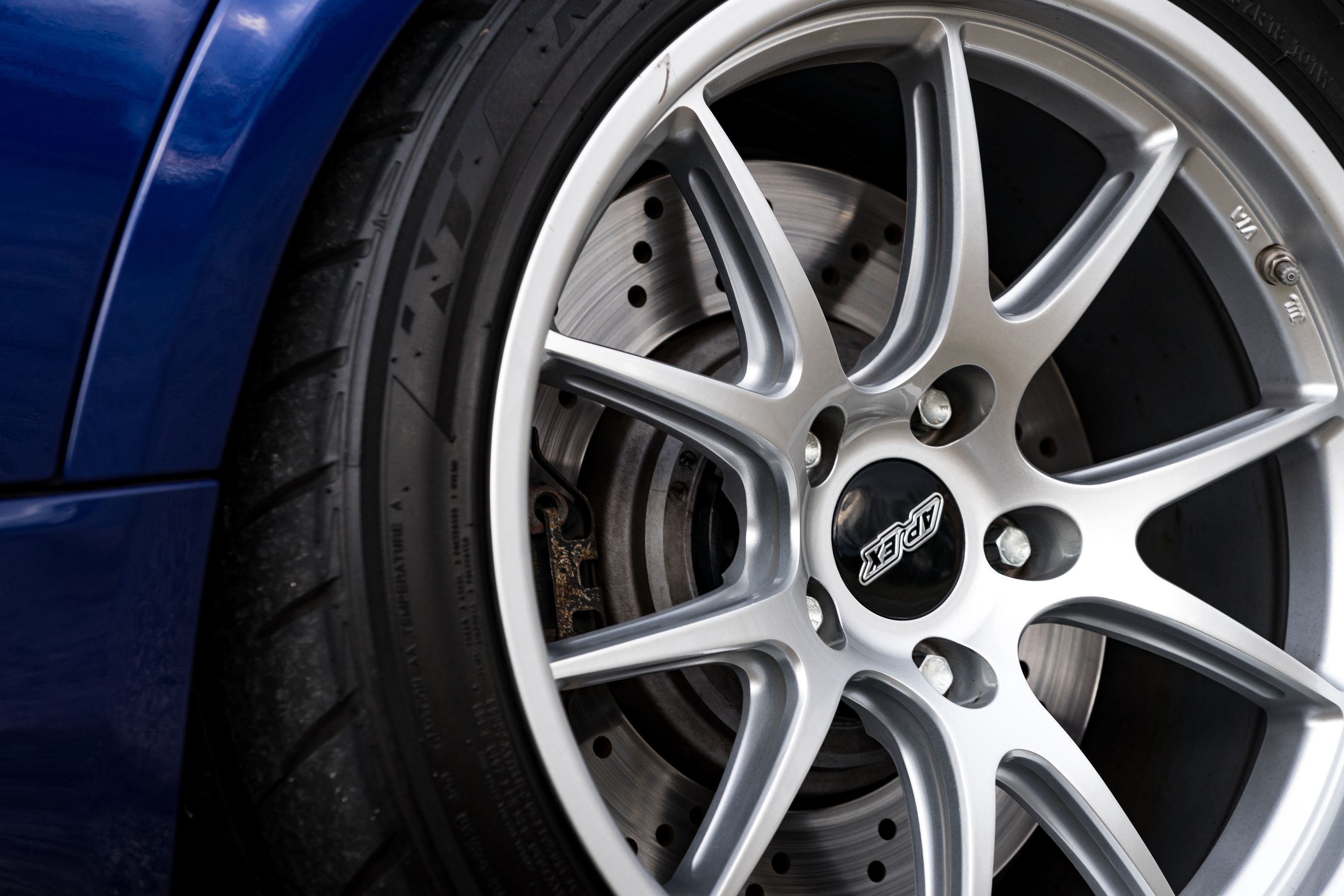 Blue BMW E90 Sedan M3 with 18" FL-5 Apex wheels in Race Silver