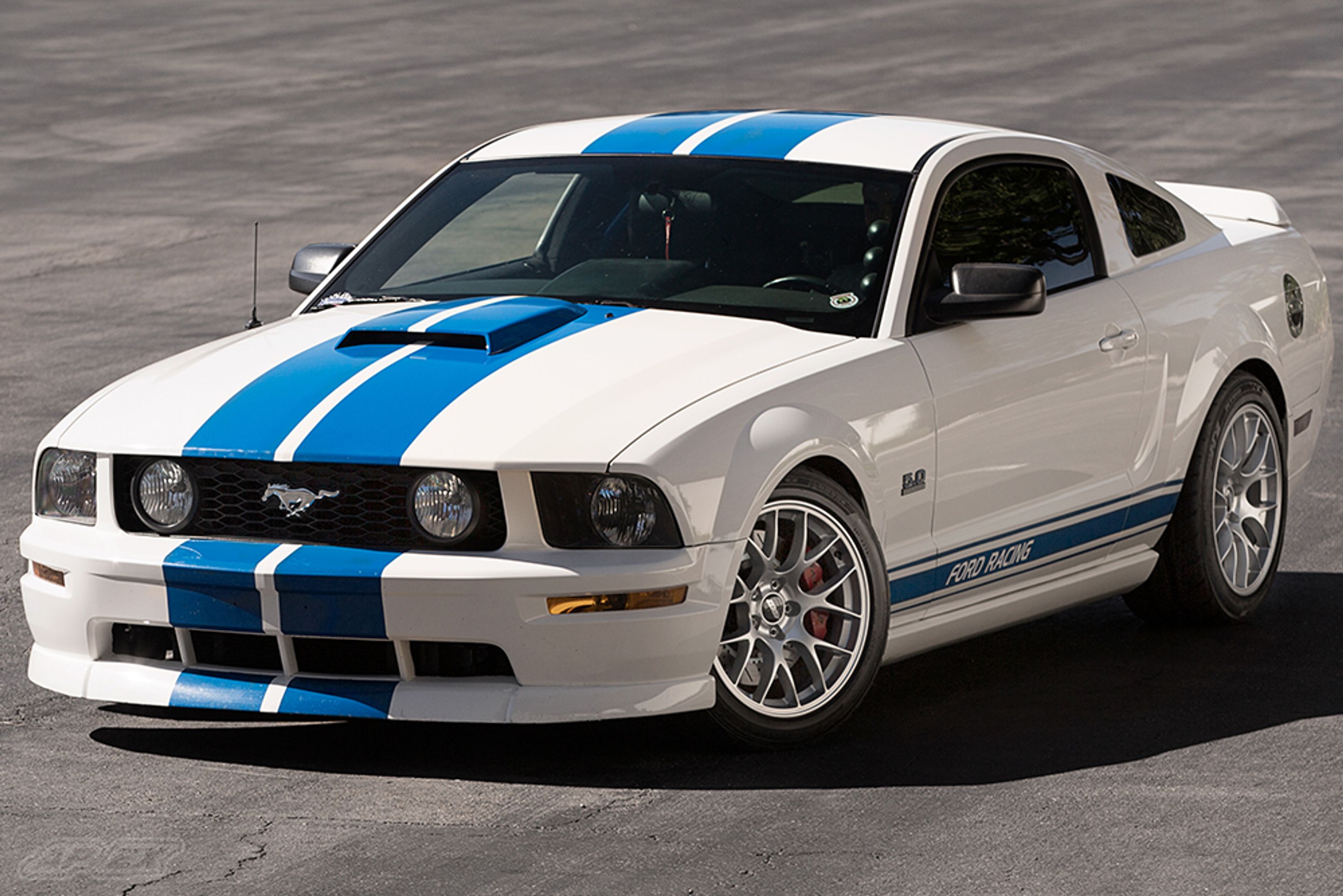 White Ford S197 Mustang GT with 18" EC-7 Apex wheels in Race Silver