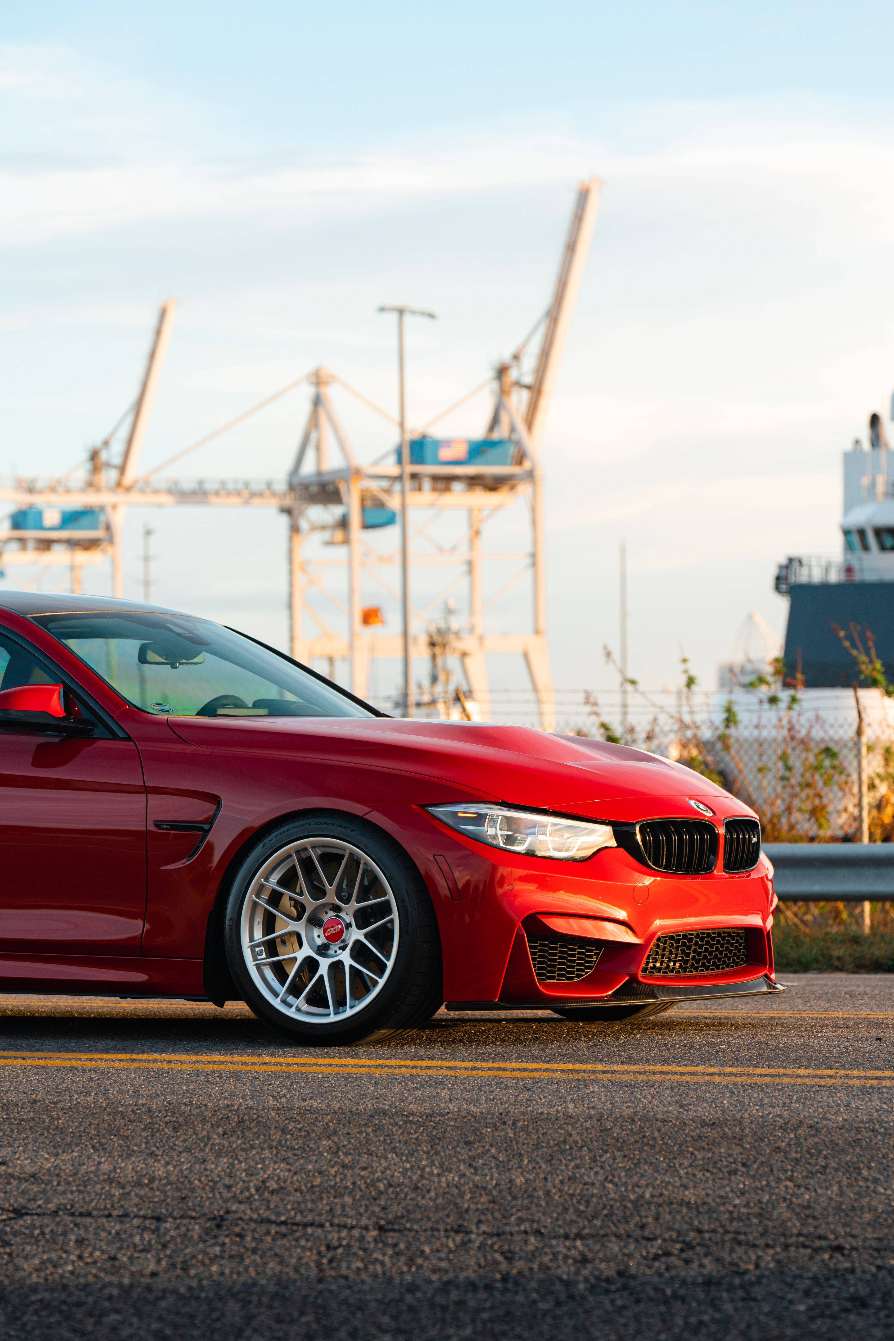 Red BMW F82 Coupe M4 with 19" ARC-8 Apex wheels in Hyper Silver