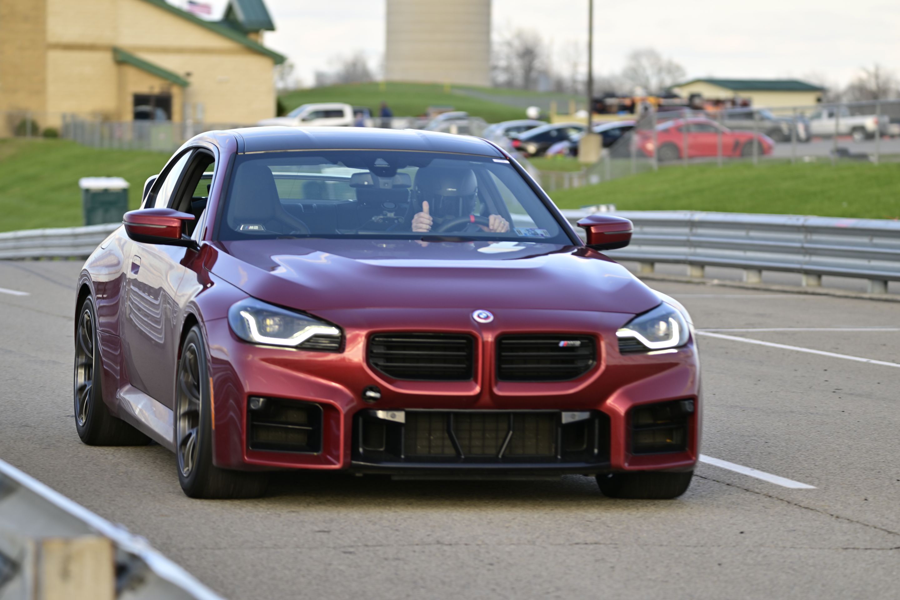 Red BMW G87 M2 with 18" VS-5RS Apex wheels in Anthracite