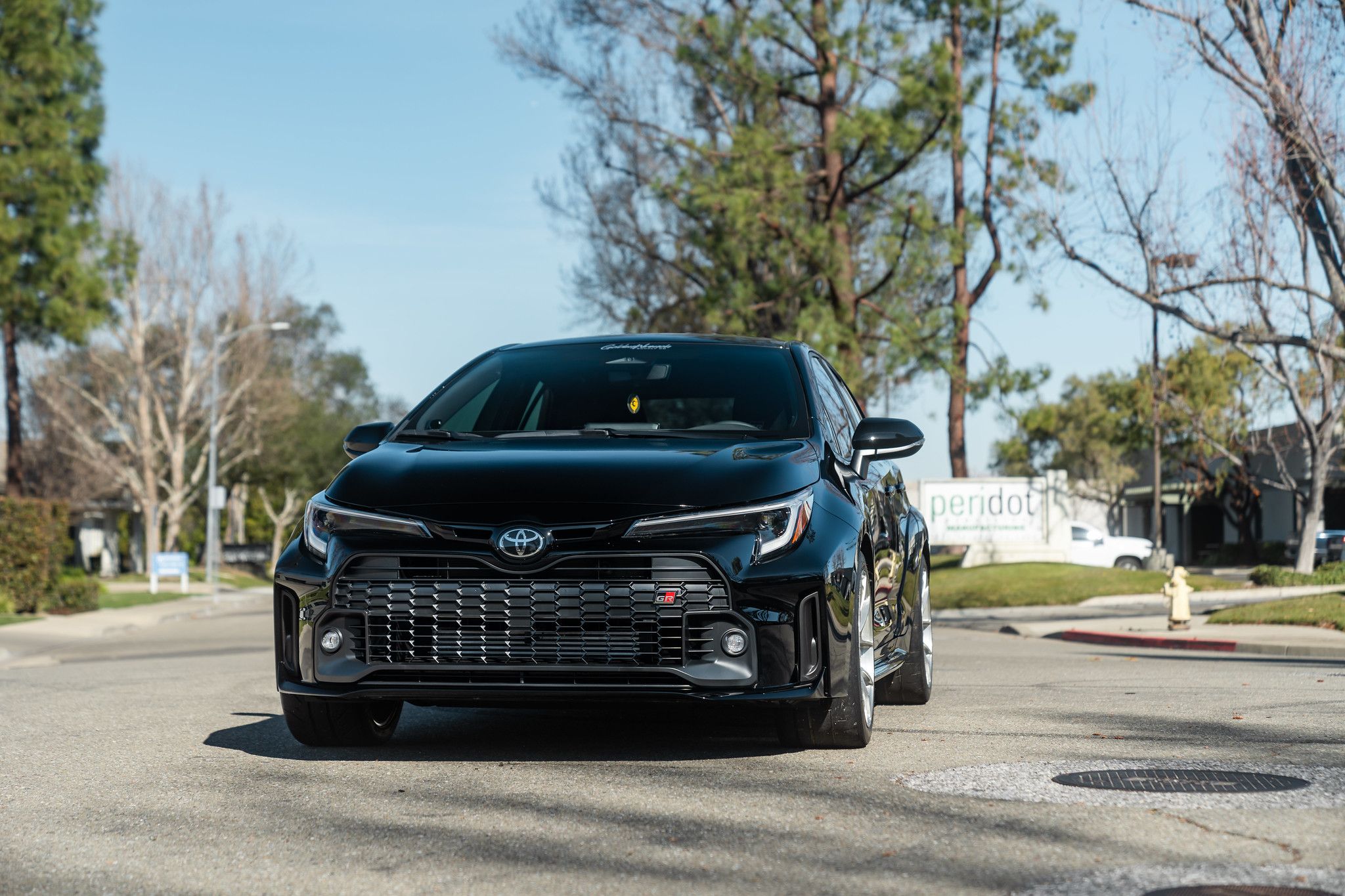 Black Toyota GR Corolla with 18" VS-5RS Apex wheels in Brushed Clear