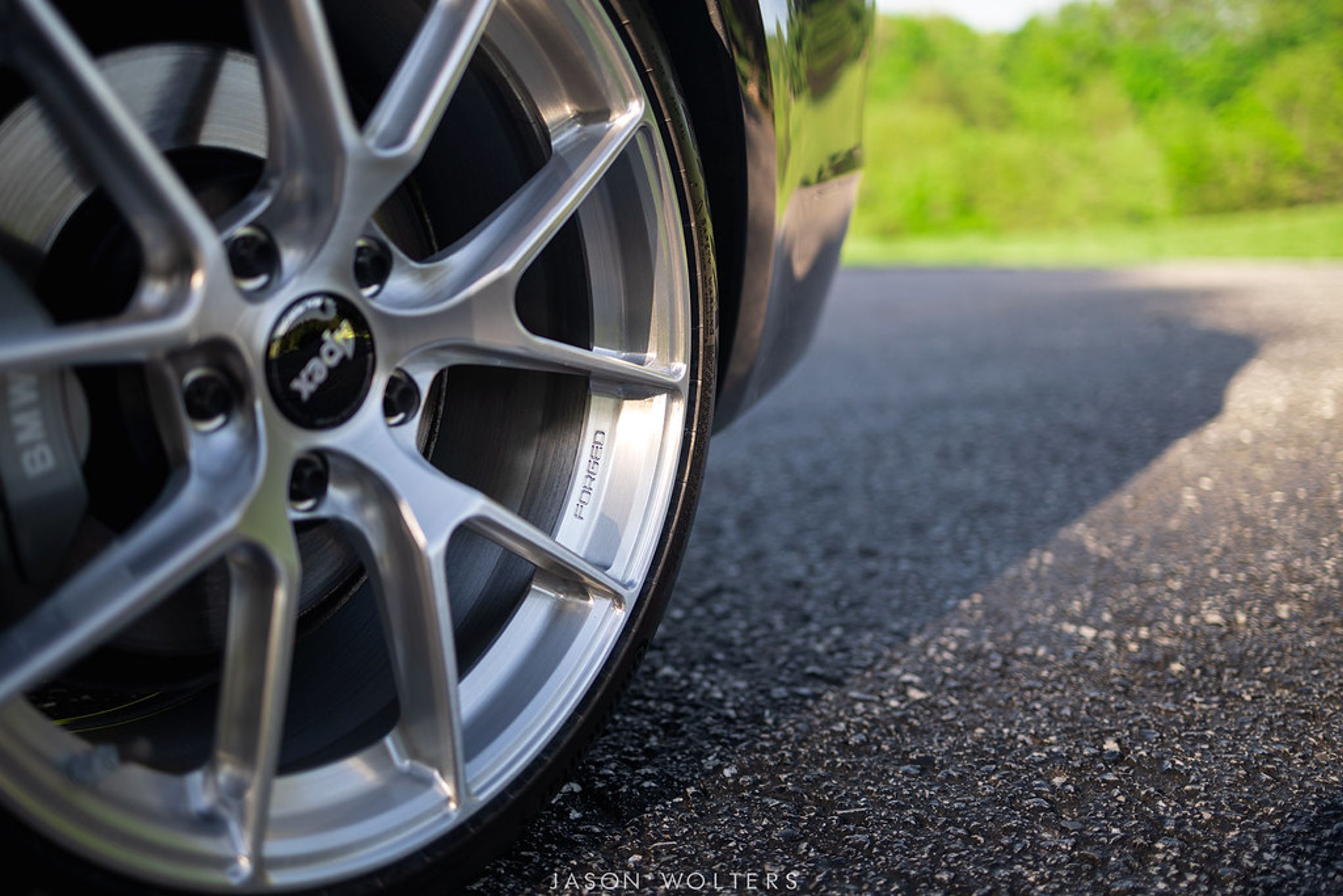 Black BMW E82 Coupe 1 Series with 18" VS-5RS Apex wheels in Brushed Clear