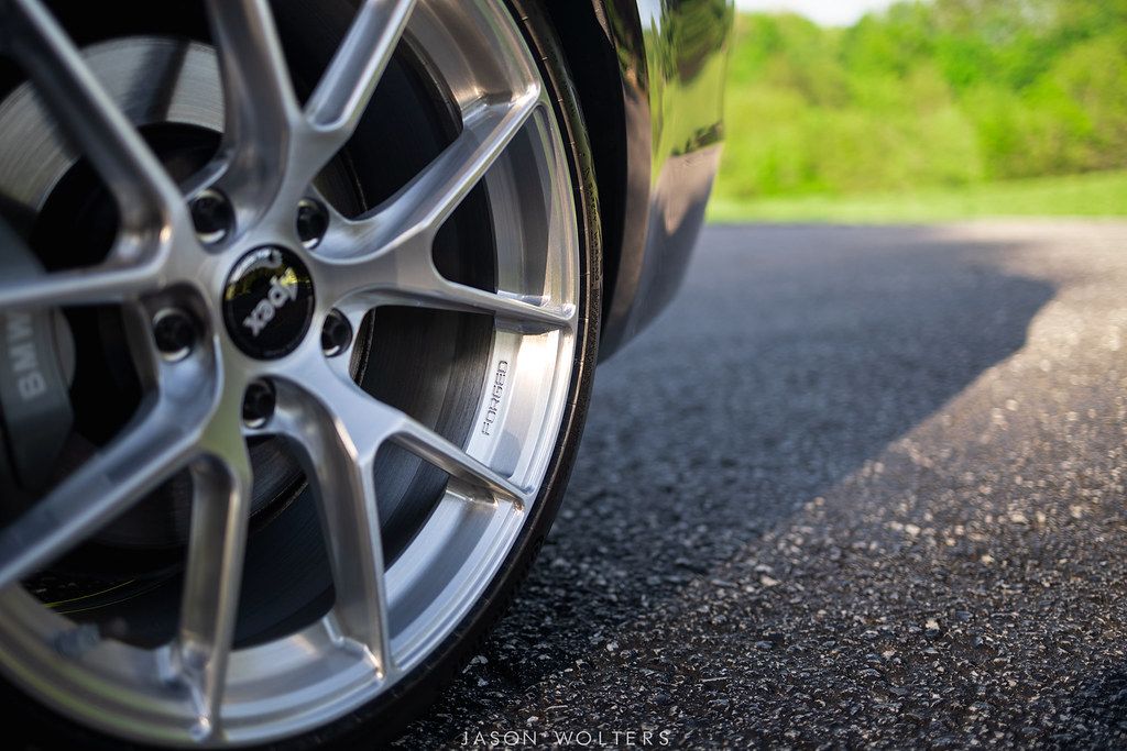 Black BMW E82 Coupe 1 Series with 18" VS-5RS Apex wheels in Brushed Clear