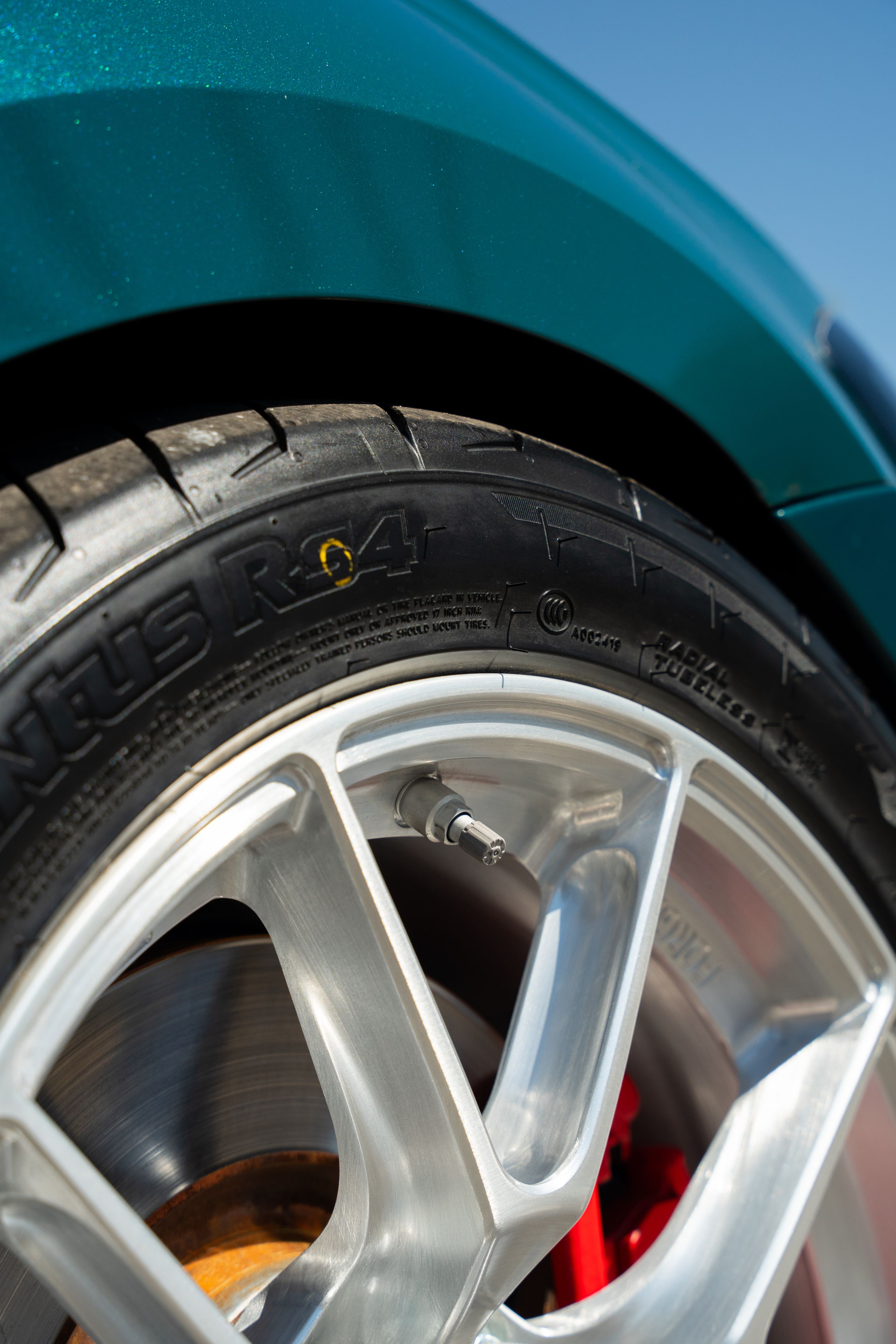 Green VW MK7 GTI with 17" VS-5RS Apex wheels in Brushed Clear