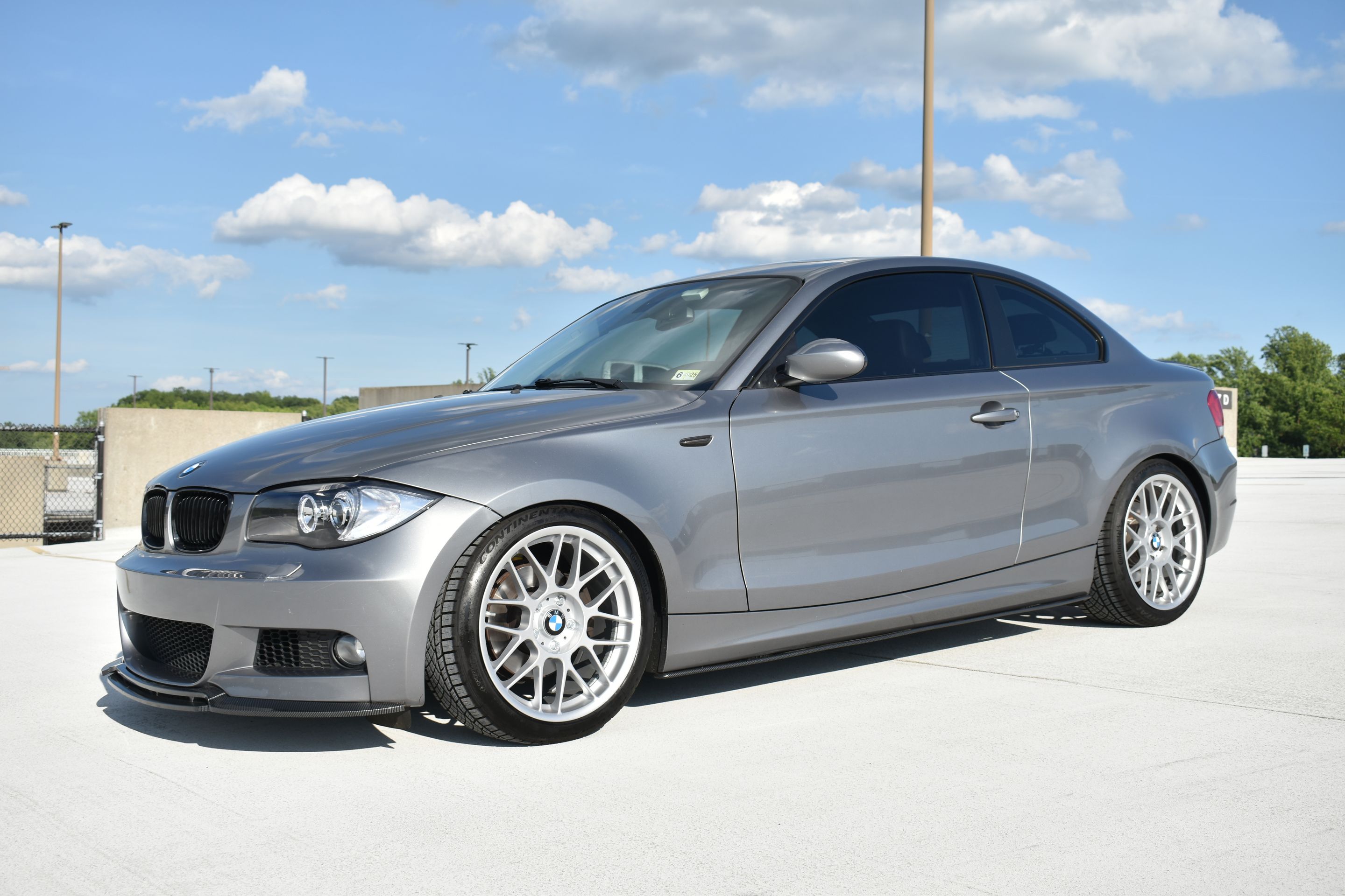 Silver BMW E82 Coupe 1 Series with 18" ARC-8 Apex wheels in Race Silver