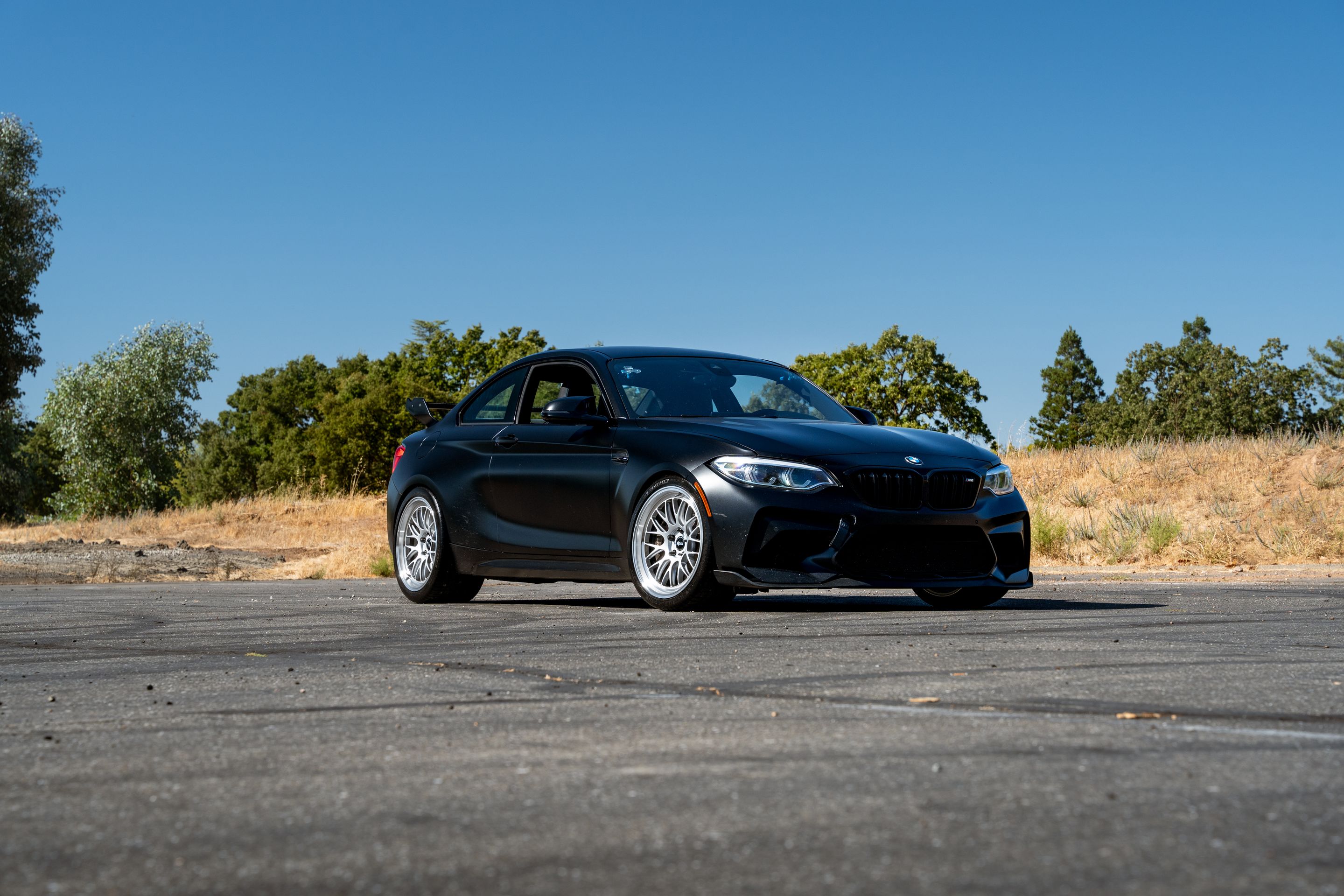 Black BMW F87 M2 with 19" ML-10RT Apex wheels in Machined Lip Race Silver