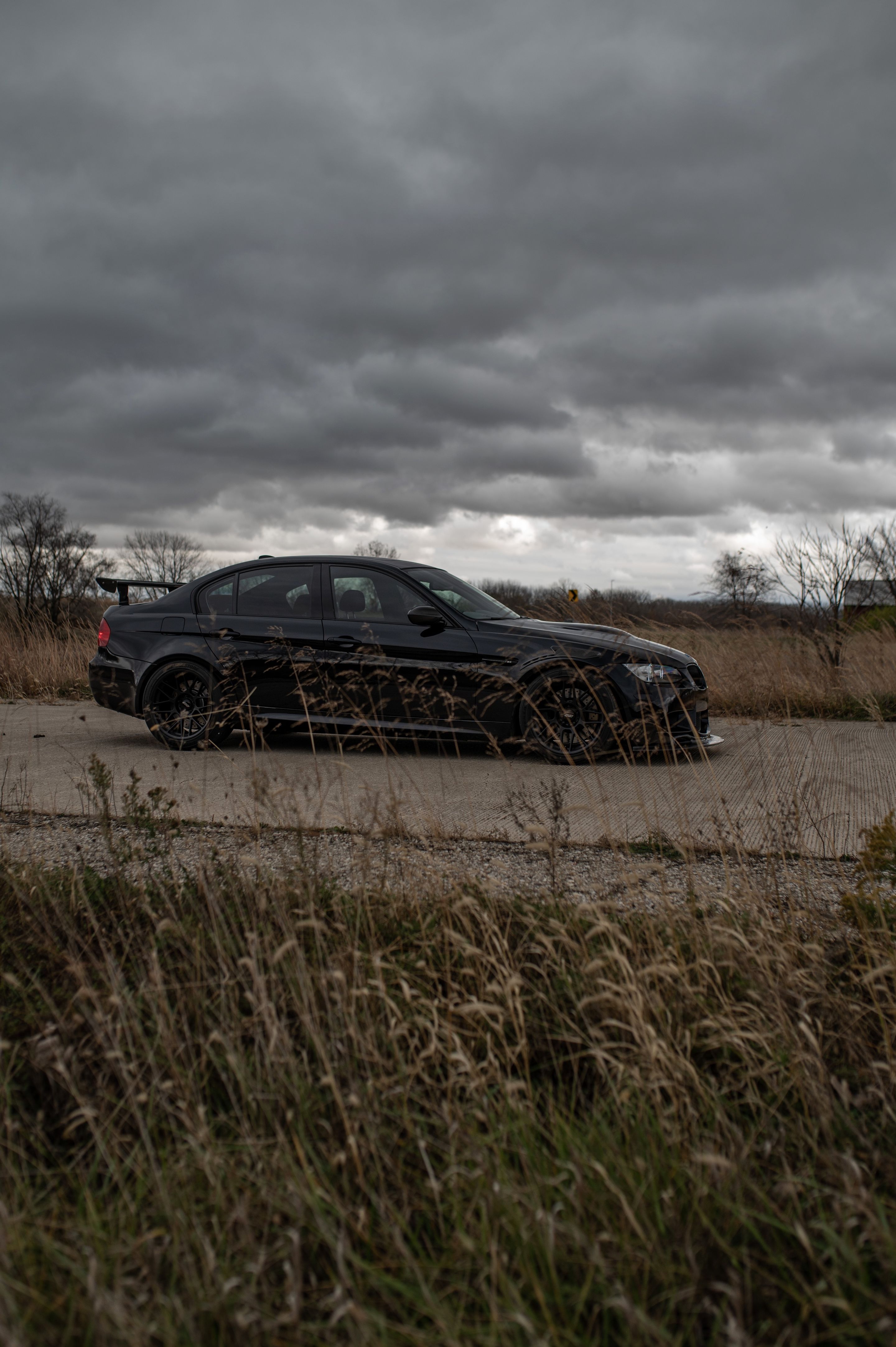 Black BMW E90 Sedan M3 with 18" ARC-8 Apex wheels in Satin Black