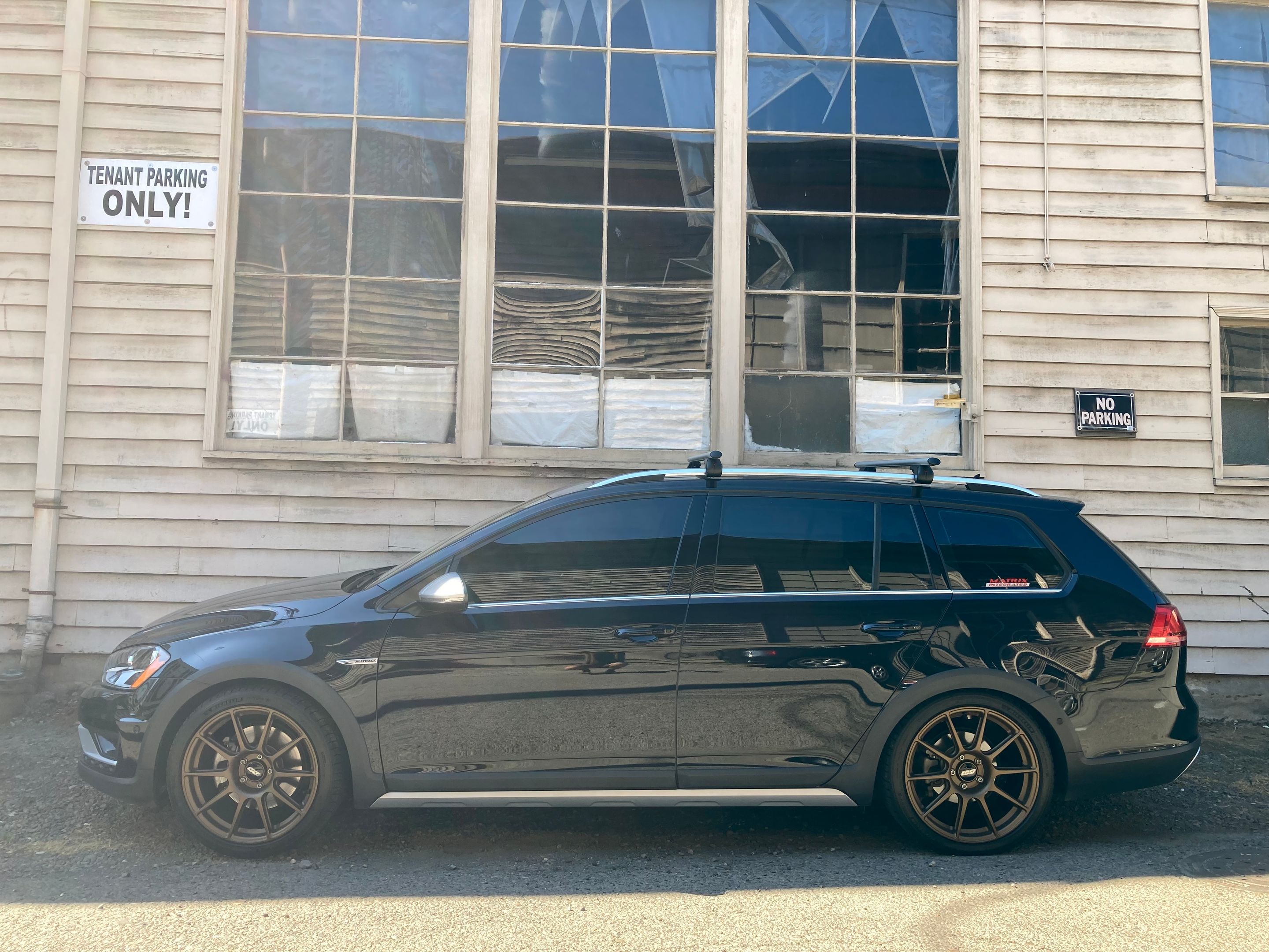 Black VW MK7 Alltrack/SportWagen Alltrack with 18" SM-10 Apex wheels in Satin Bronze