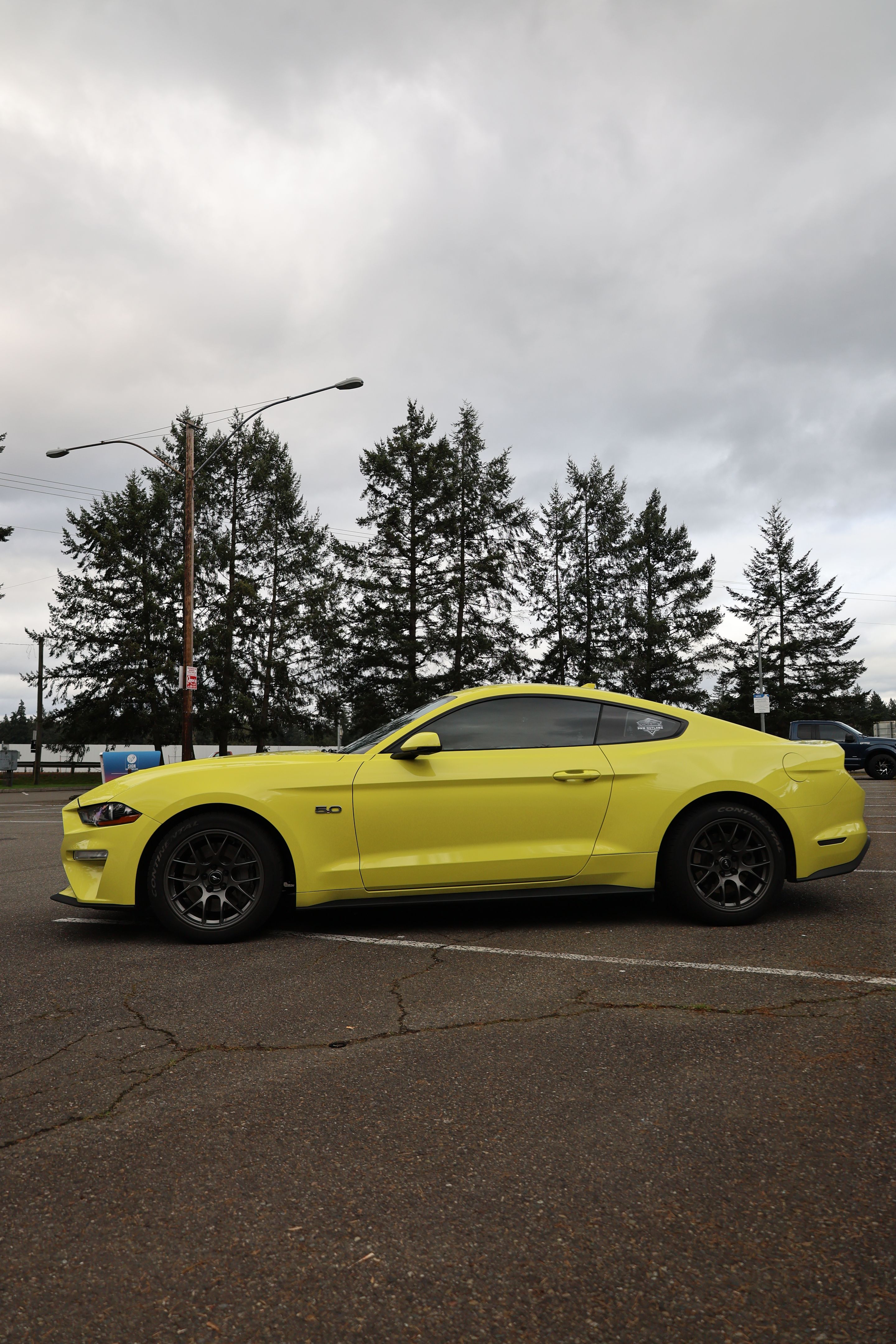 Yellow Ford S550 Mustang GT with 18" EC-7 Apex wheels in Anthracite