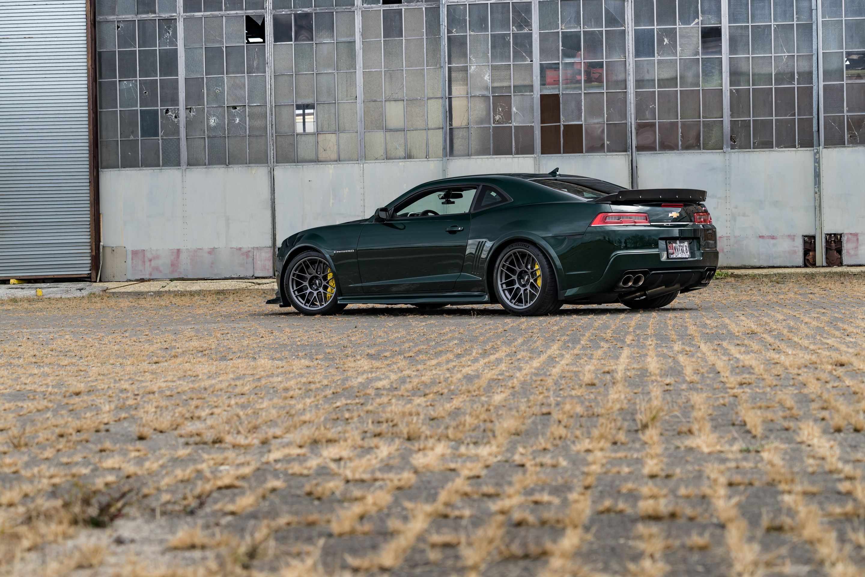 Green Chevrolet 5th Gen Camaro SS with 19" ARC-8 Apex wheels in Anthracite