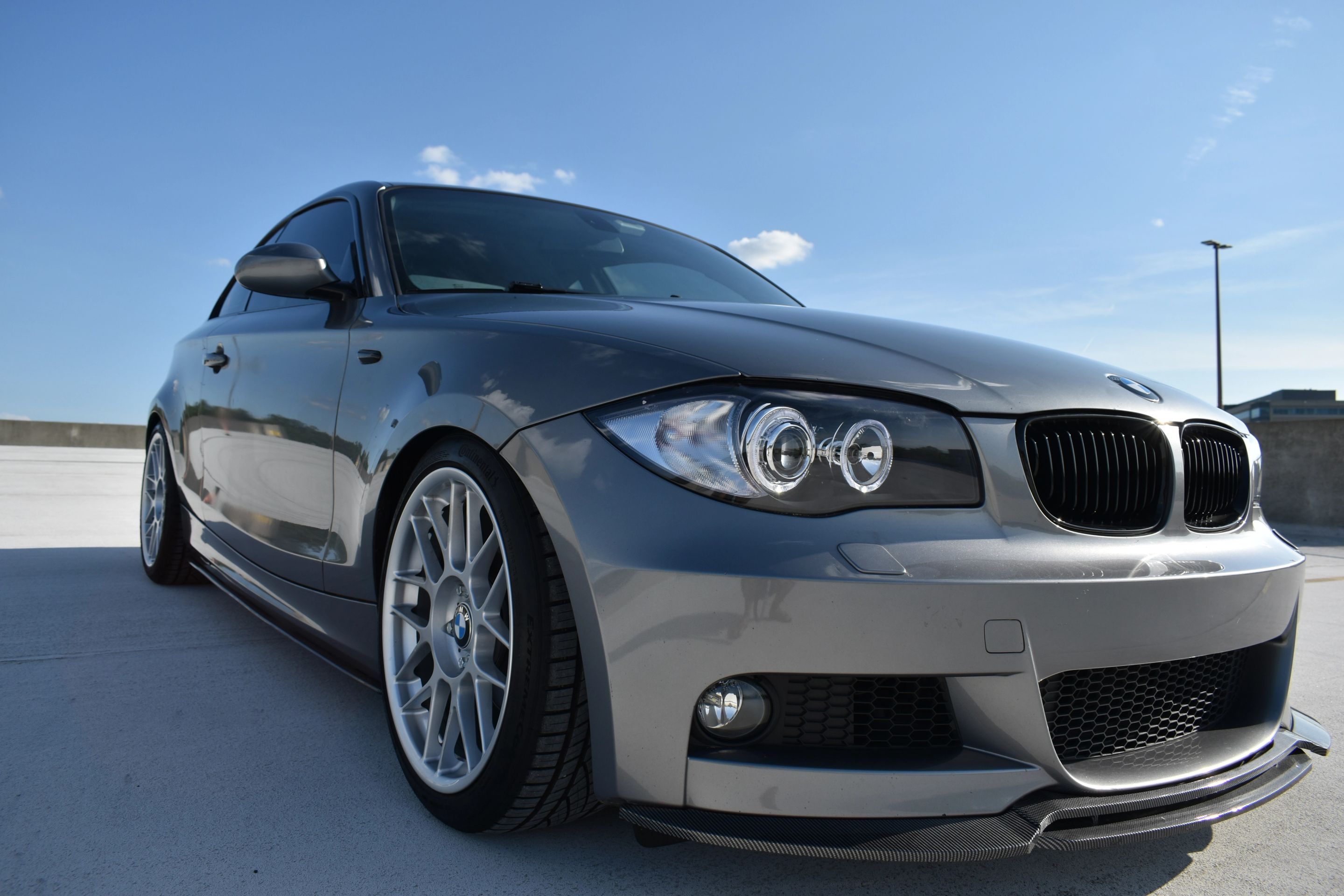 Silver BMW E82 Coupe 1 Series with 18" ARC-8 Apex wheels in Race Silver