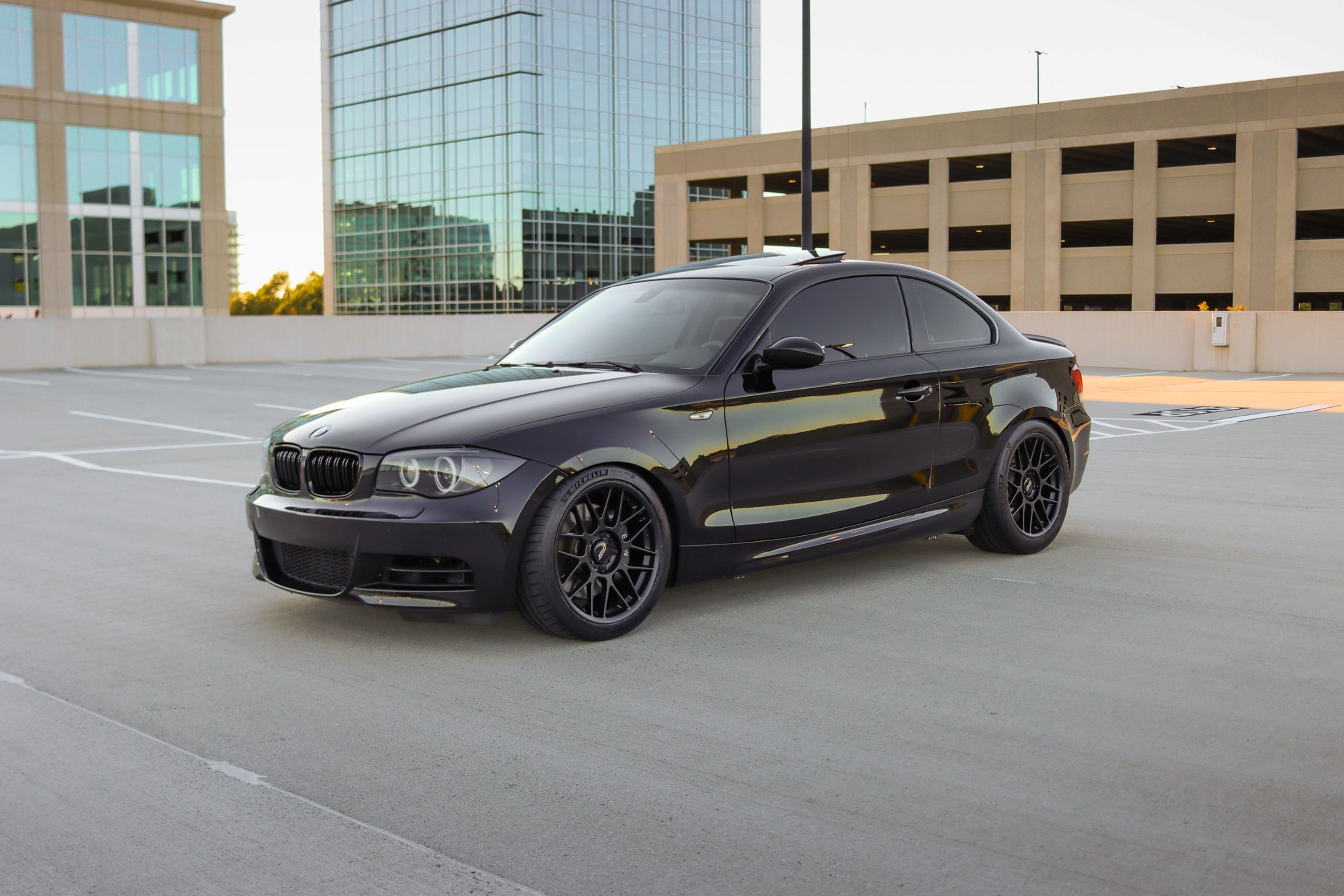 Black BMW E82 Coupe 1 Series with 18" ARC-8 Apex wheels in Satin Black