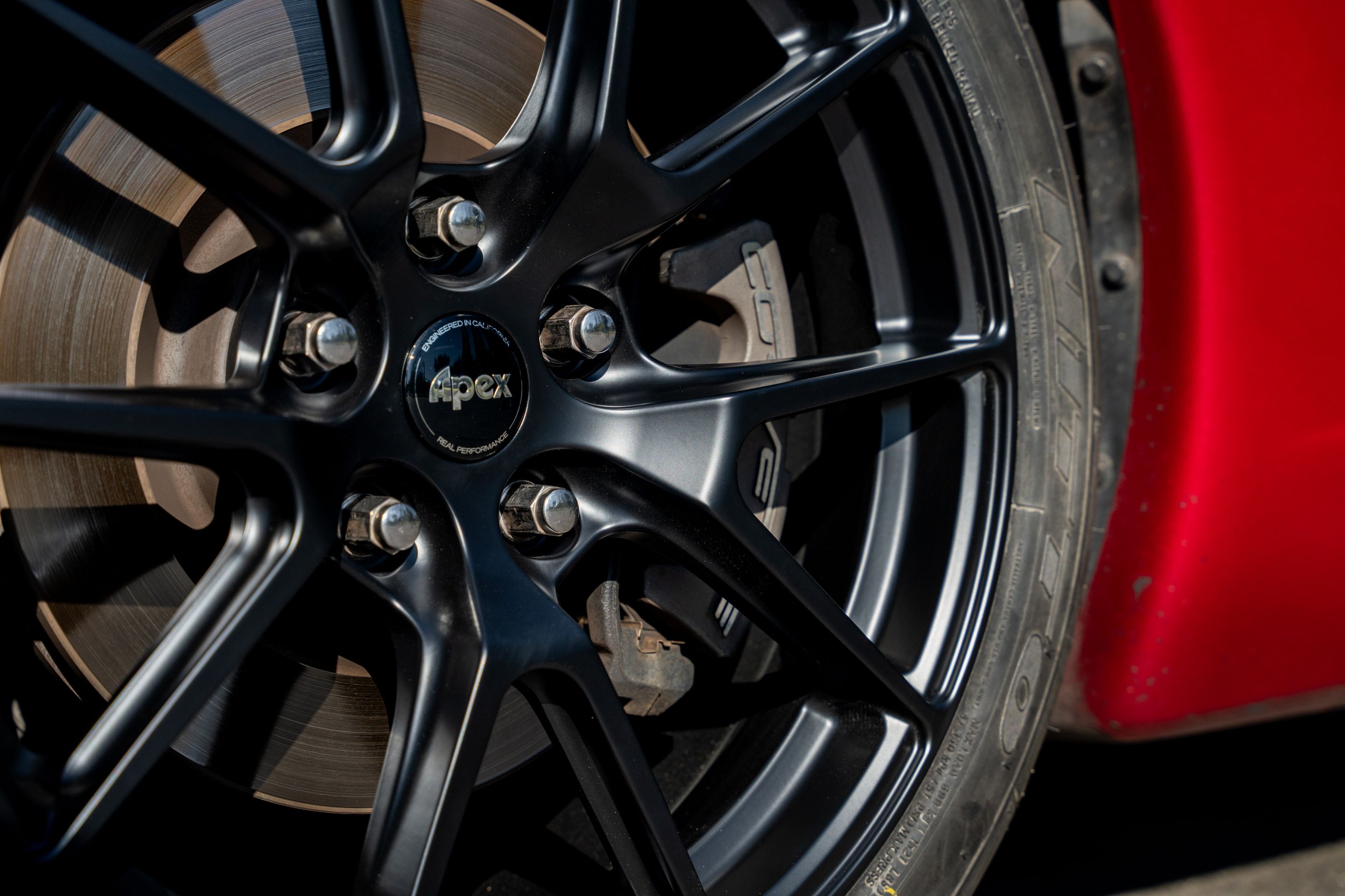 Red Chevrolet C6 Corvette Base/Z51 with 18" VS-5 Apex wheels in Satin Black