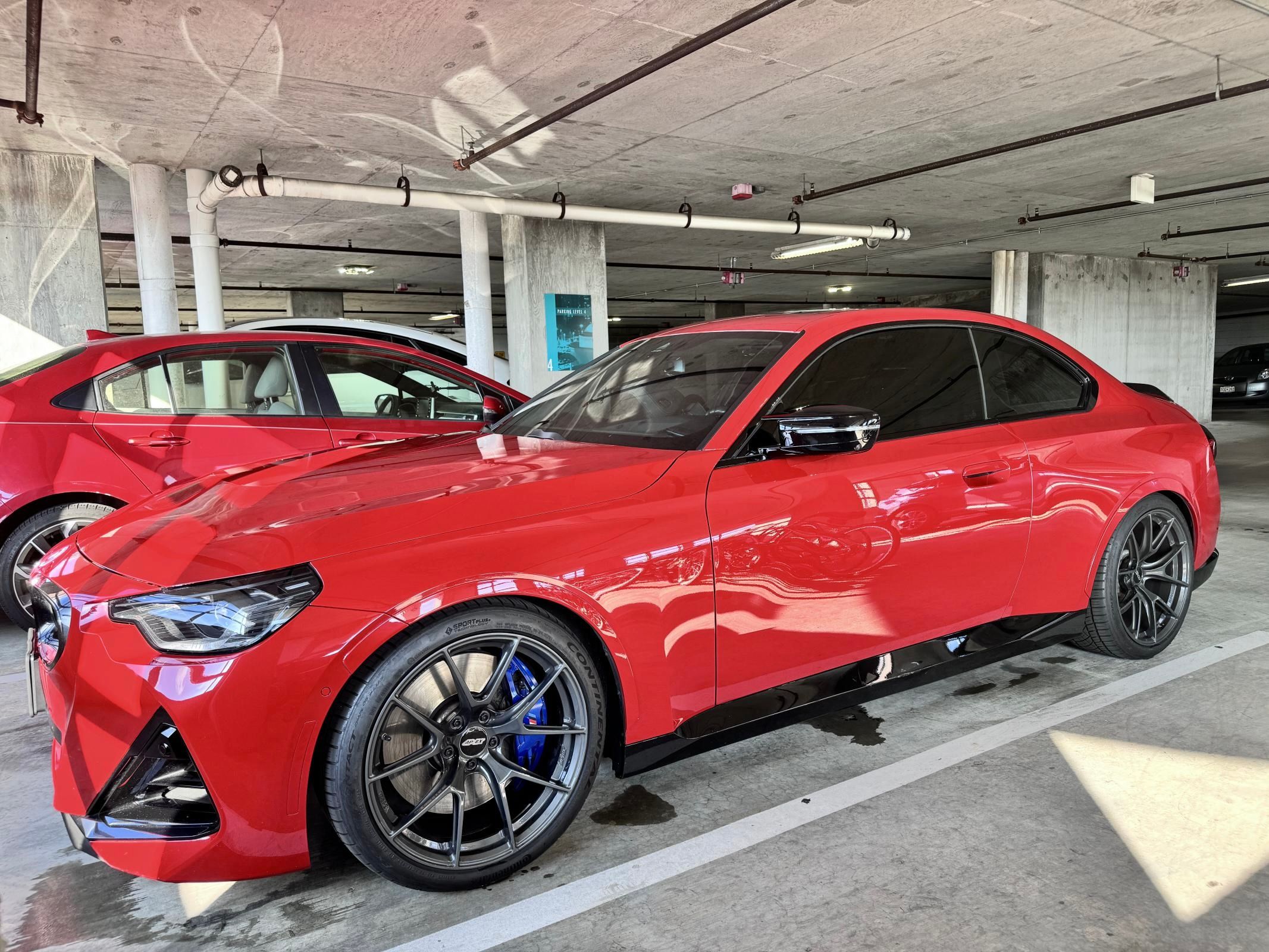Red BMW G42 2 Series with 19" VS-5RS Apex wheels in Anthracite