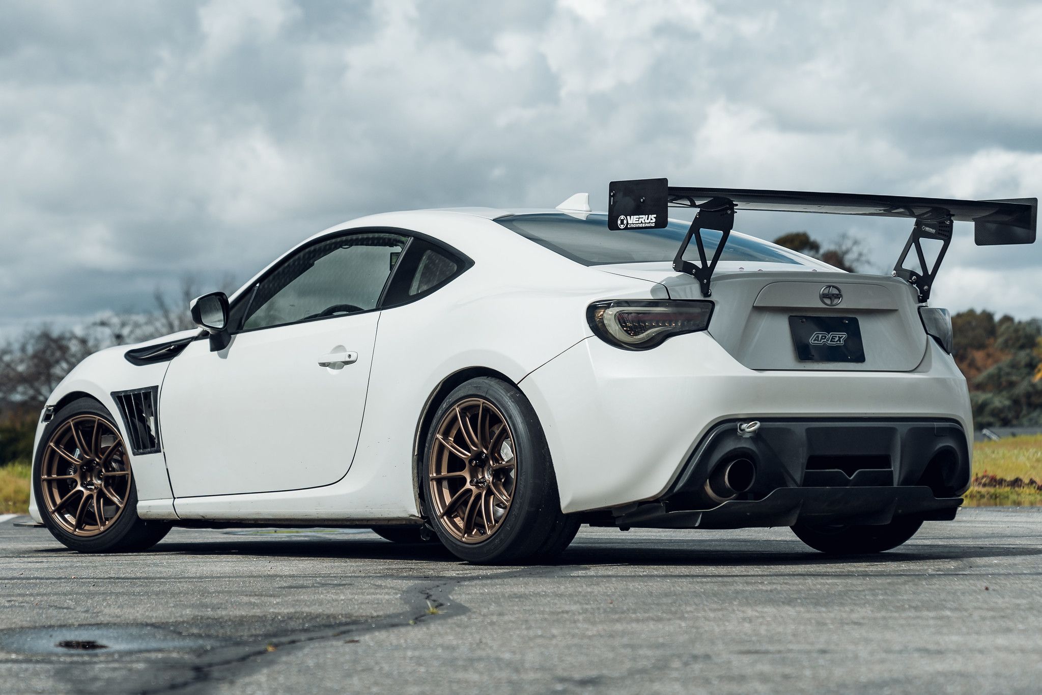 White Scion FR-S with 17" SM-10RS Apex wheels in Satin Bronze