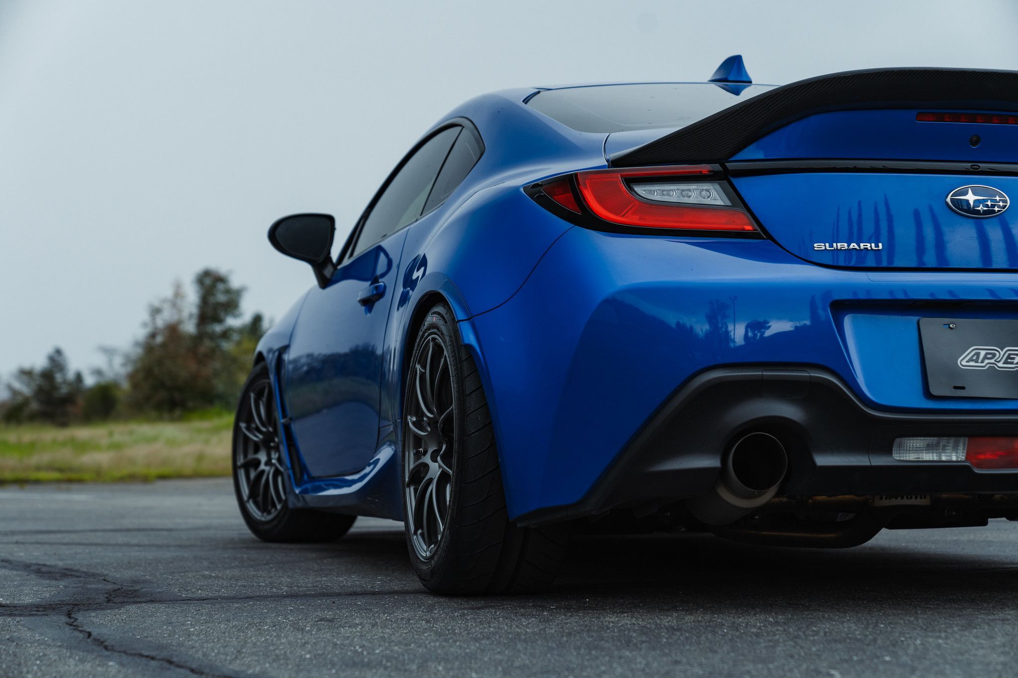Blue Subaru ZD8 / Gen 2 BRZ with 17" SM-10RS Apex wheels in Anthracite