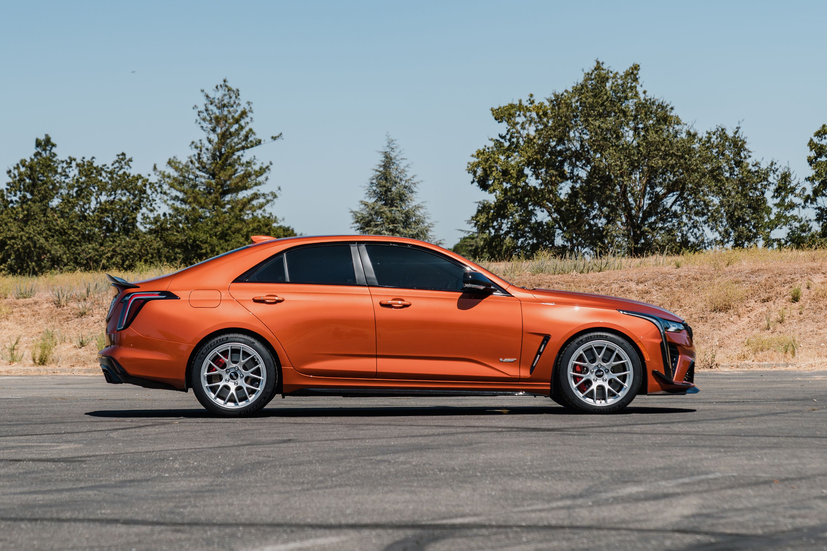 Orange Cadillac CT4-V Blackwing with 18" EC-7 Apex wheels in Race Silver