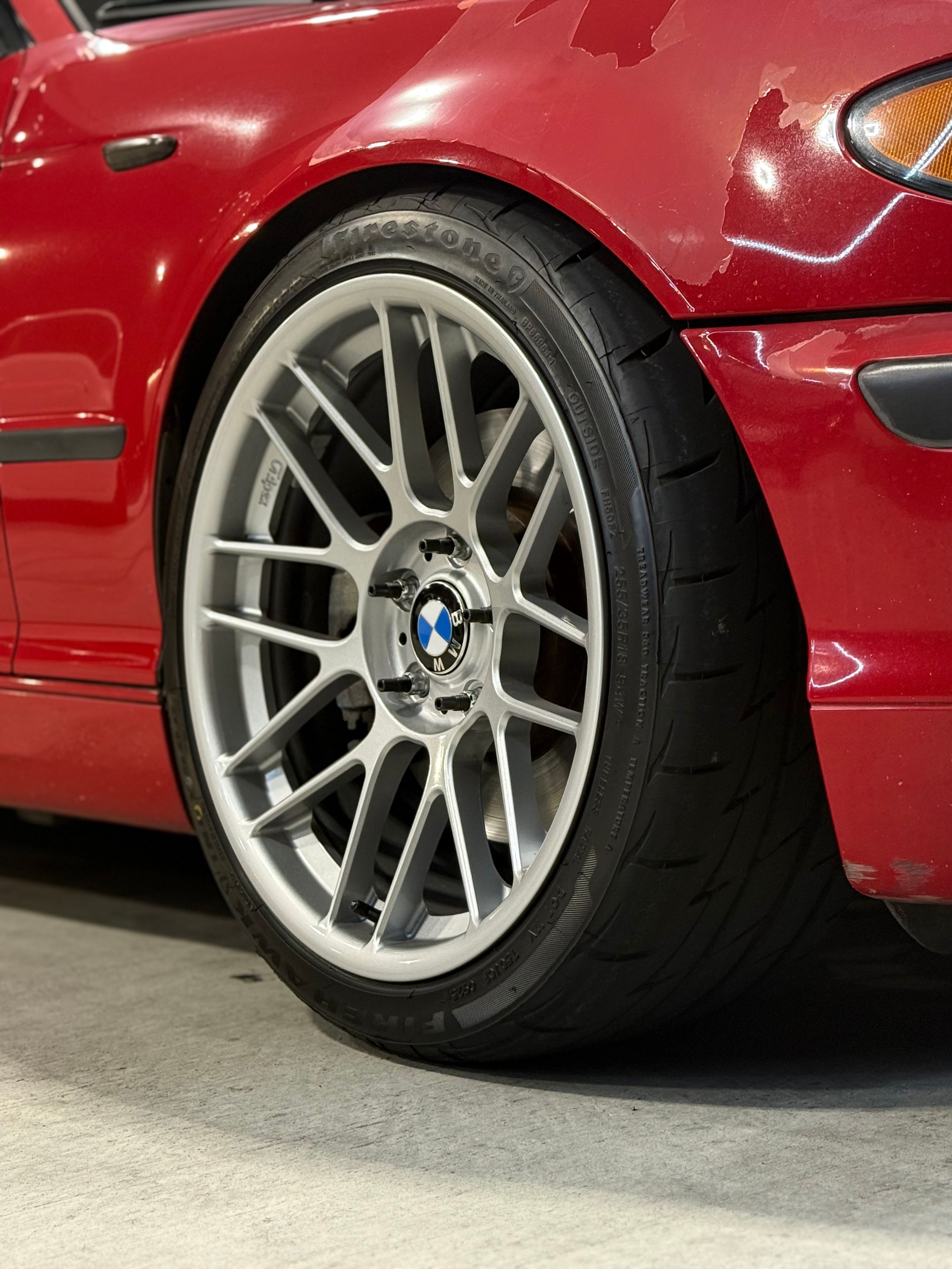 Red BMW E46 3 Series with 18" ARC-8RT Apex wheels in Race Silver