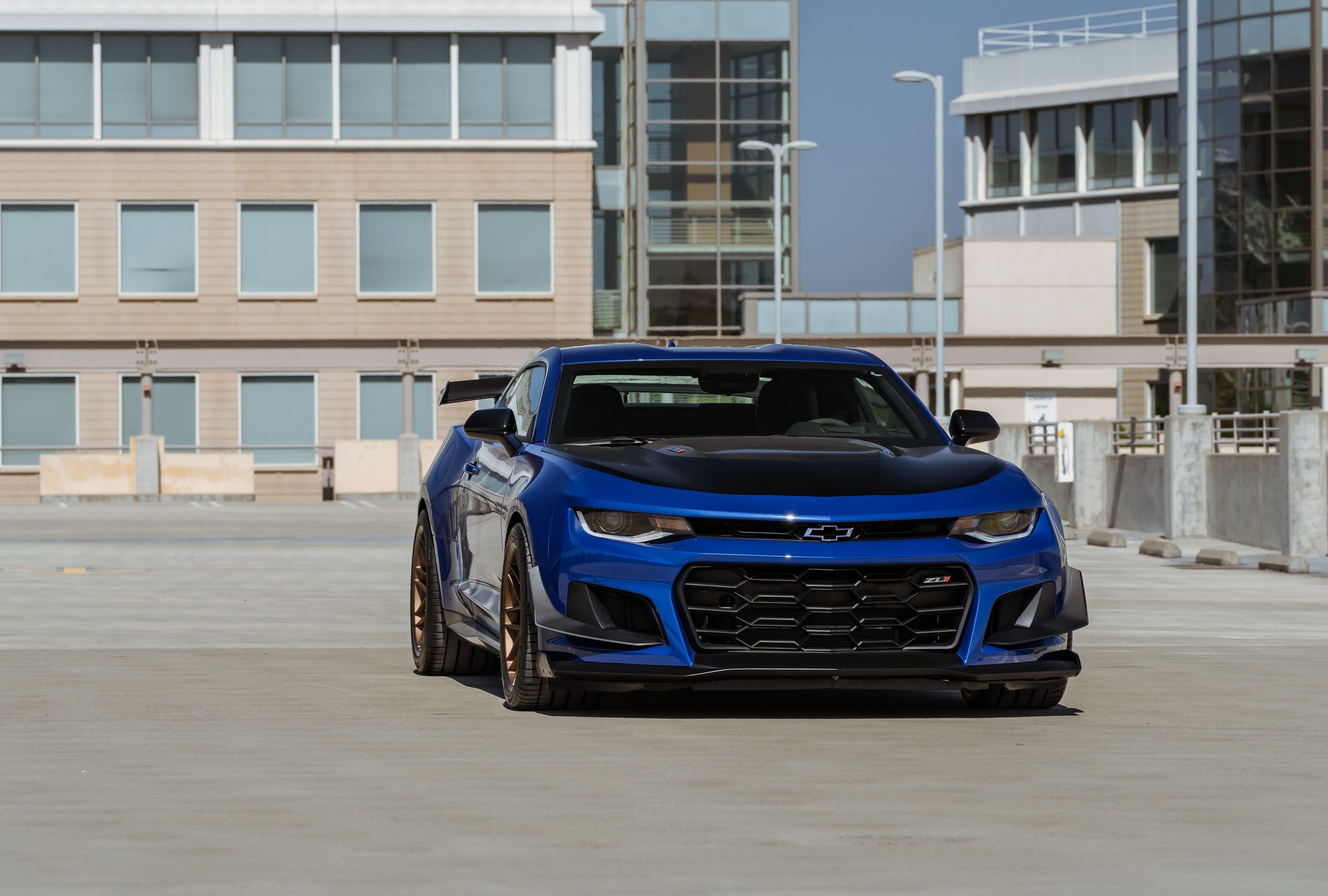 Blue Chevrolet 6th Gen Camaro ZL1 1LE with 19" ARC-8 Apex wheels in Satin Bronze